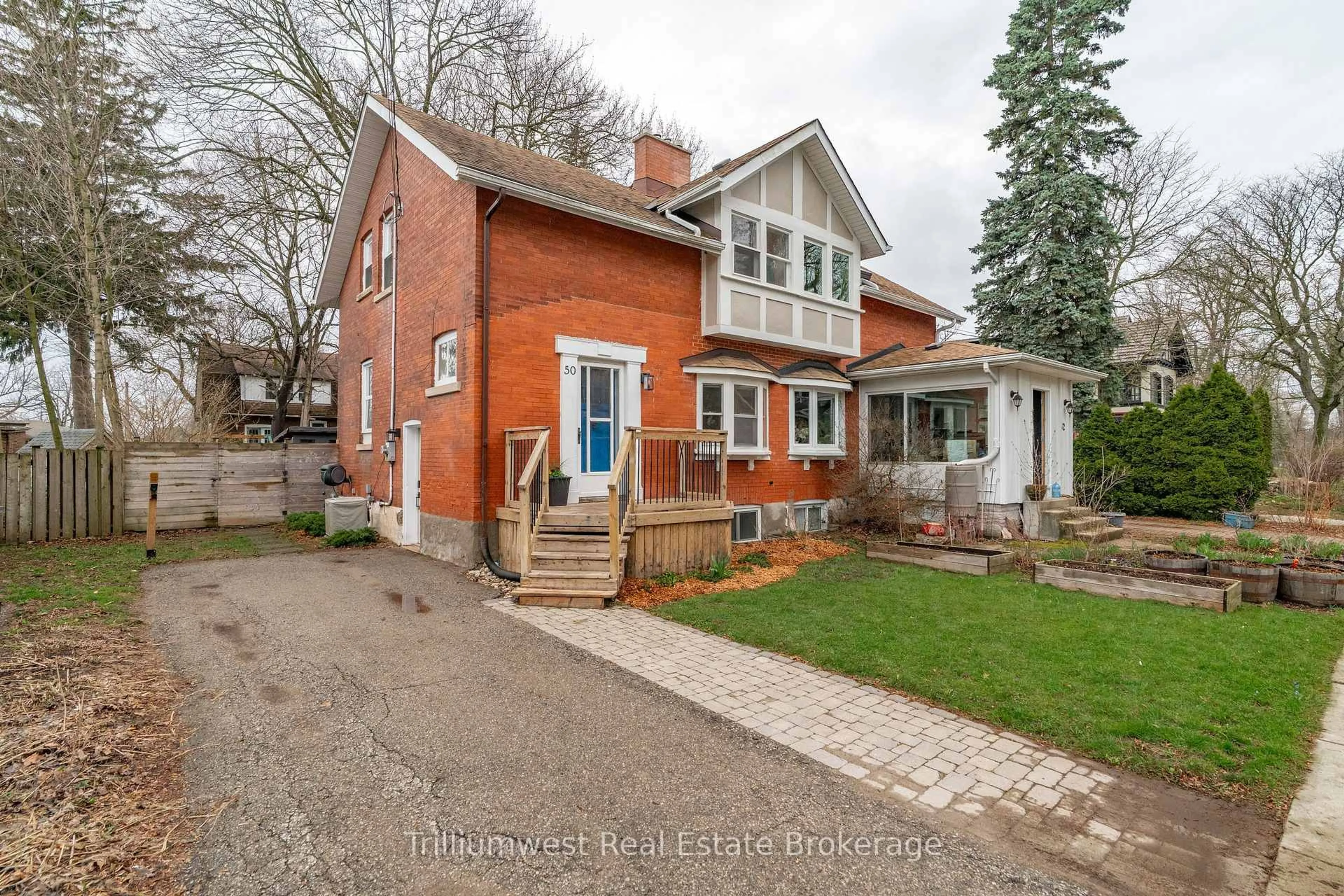 Home with brick exterior material, street for 50 Hillcrest Dr, Guelph Ontario N1E 4W9