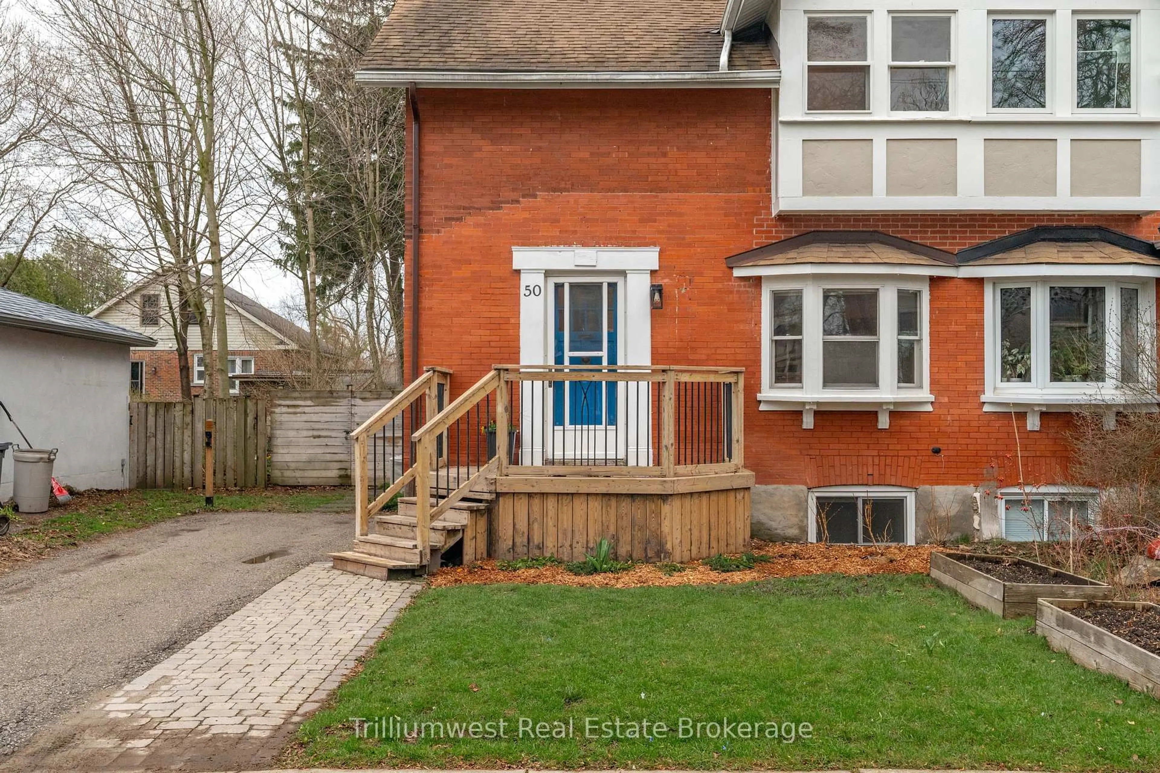 Home with brick exterior material, street for 50 Hillcrest Dr, Guelph Ontario N1E 4W9