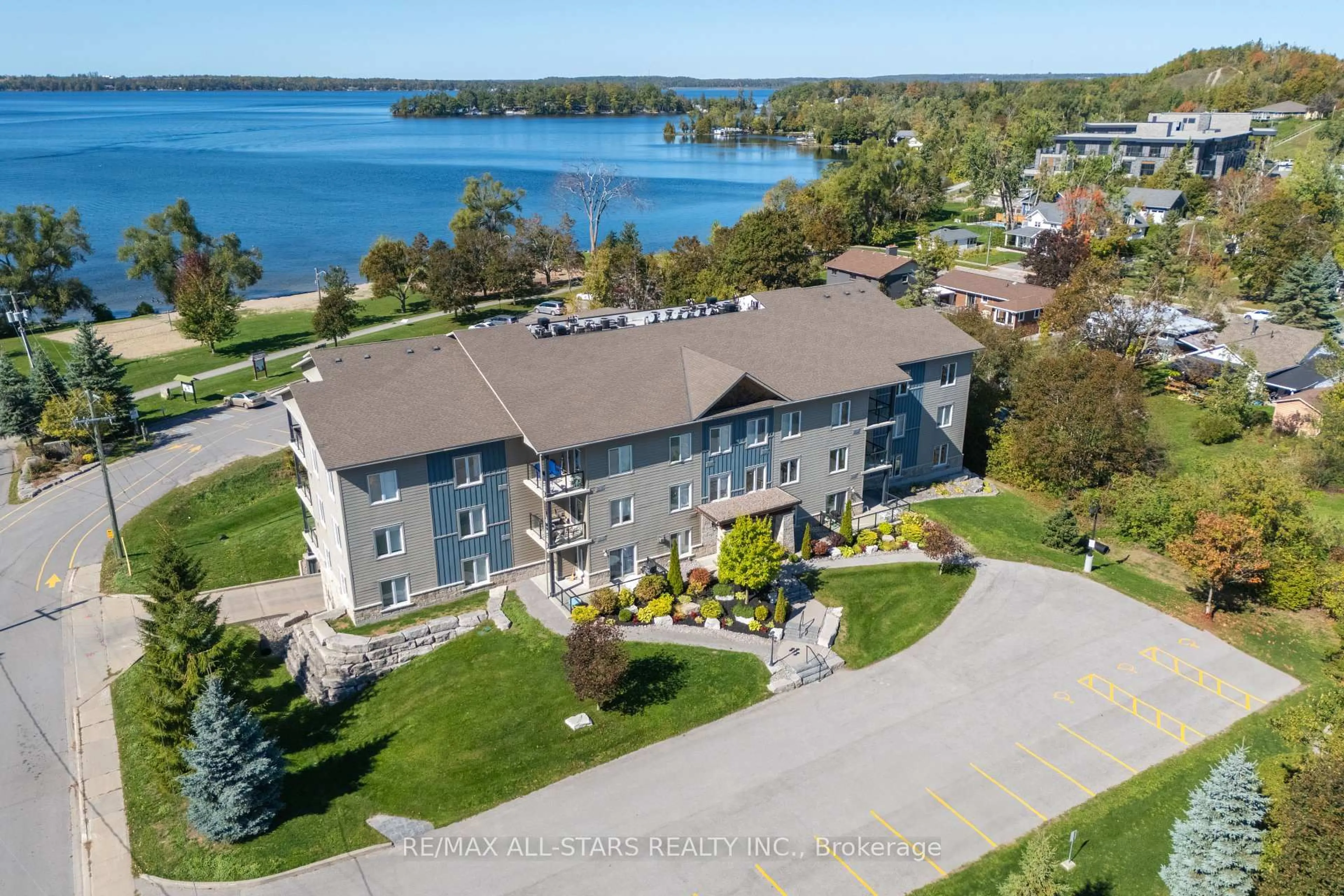 A pic from outside/outdoor area/front of a property/back of a property/a pic from drone, water/lake/river/ocean view for 94 Francis St #104, Kawartha Lakes Ontario K0M 1N0