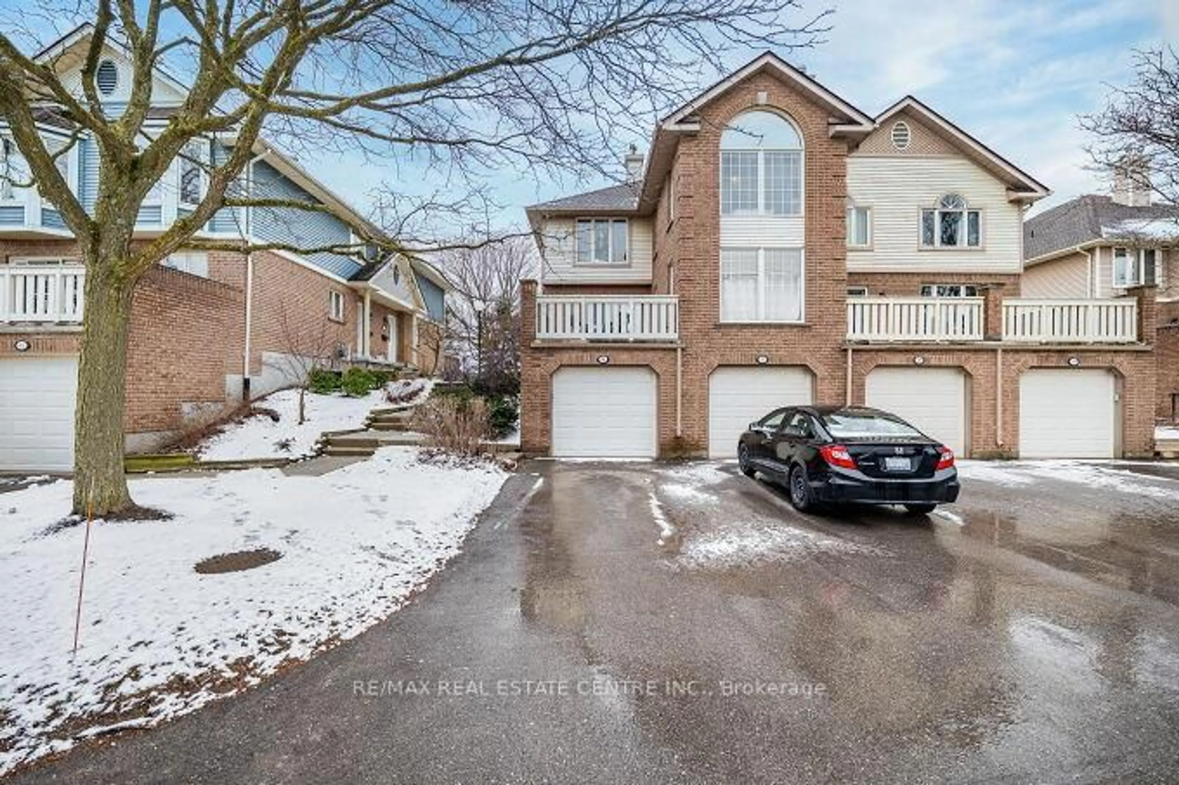 A pic from outside/outdoor area/front of a property/back of a property/a pic from drone, street for 941 Gordon St #59, Guelph Ontario N1G 4R9