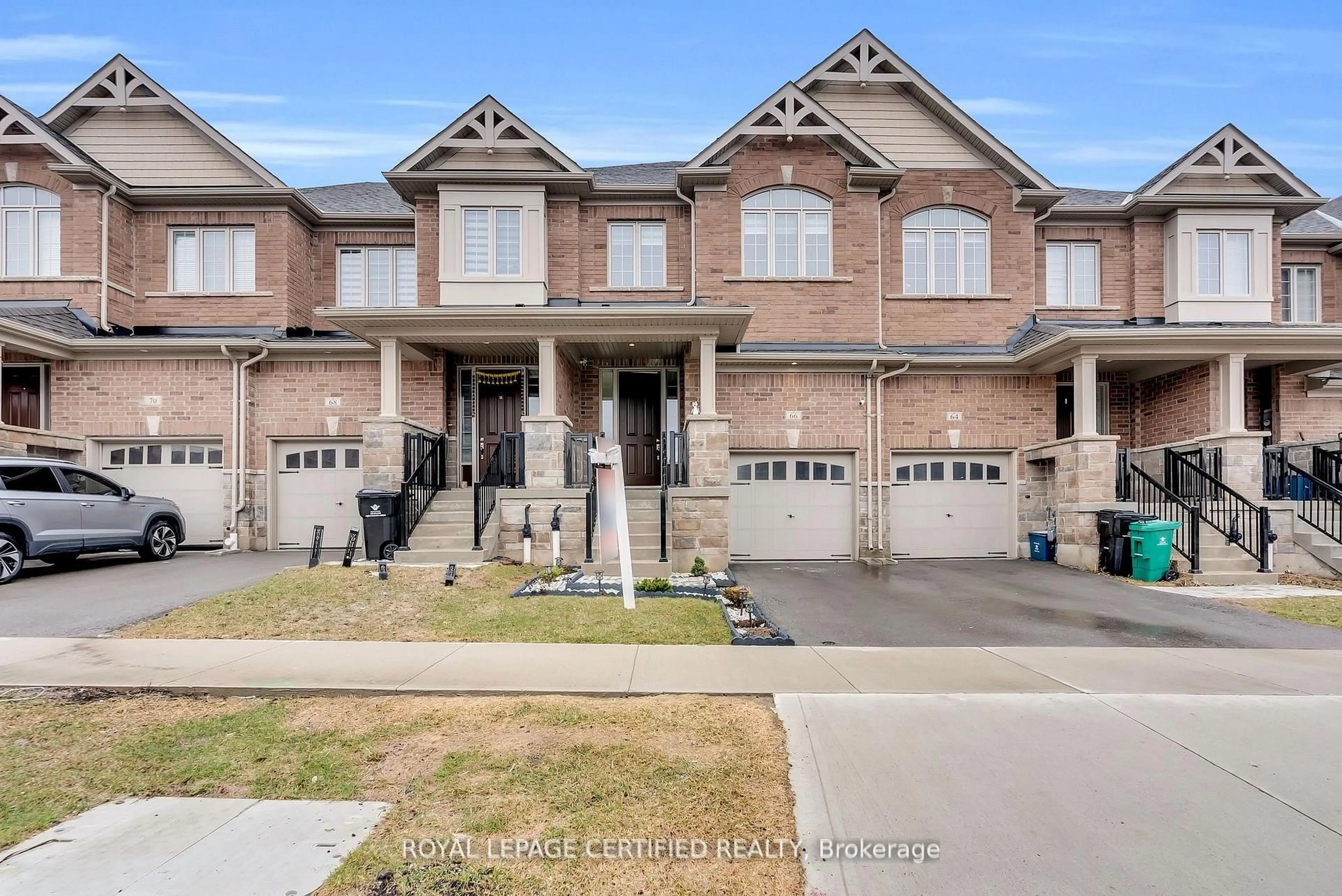 Home with brick exterior material, street for 66 Grassbourne Ave, Kitchener Ontario N2R 0S5