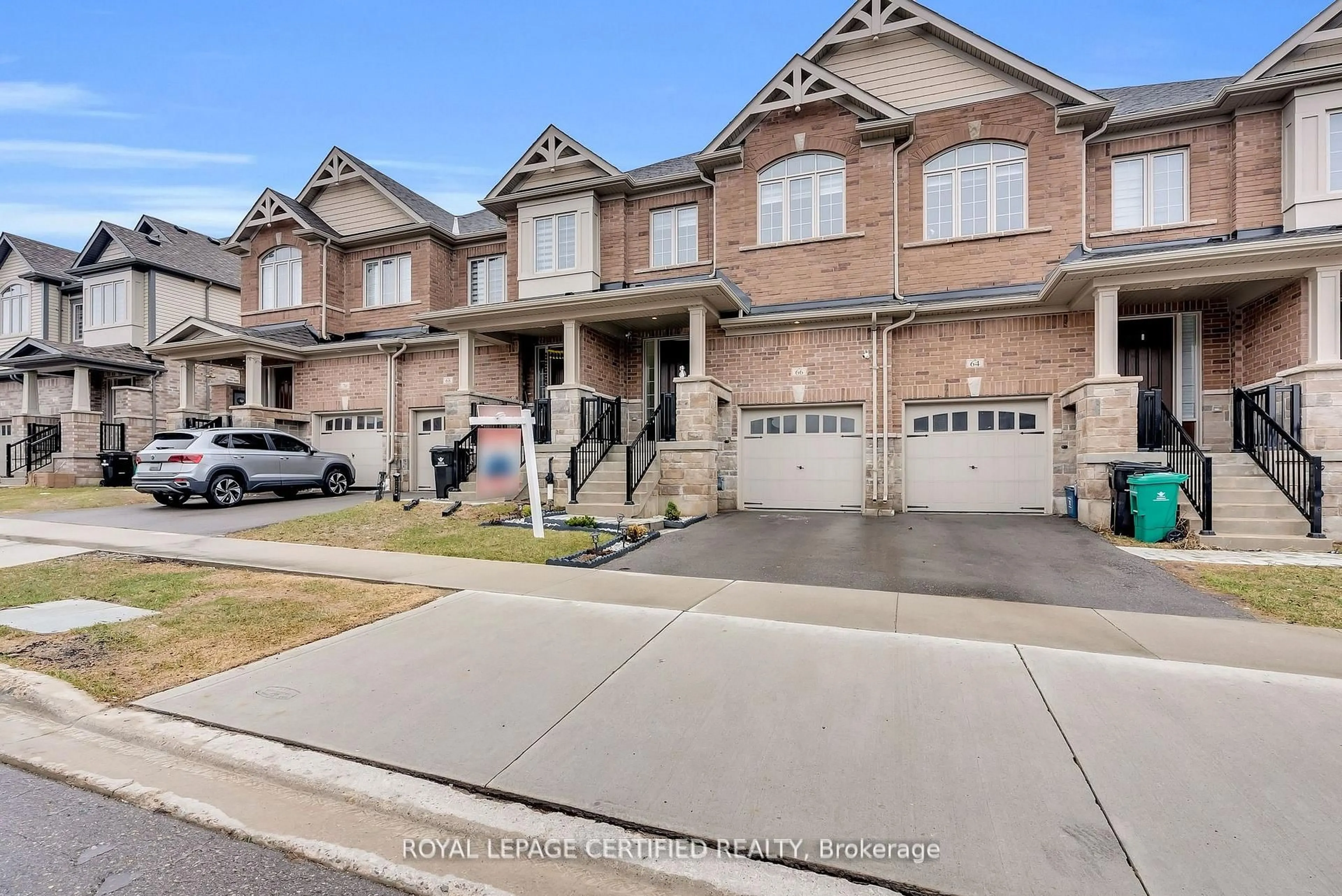 Home with brick exterior material, street for 66 Grassbourne Ave, Kitchener Ontario N2R 0S5