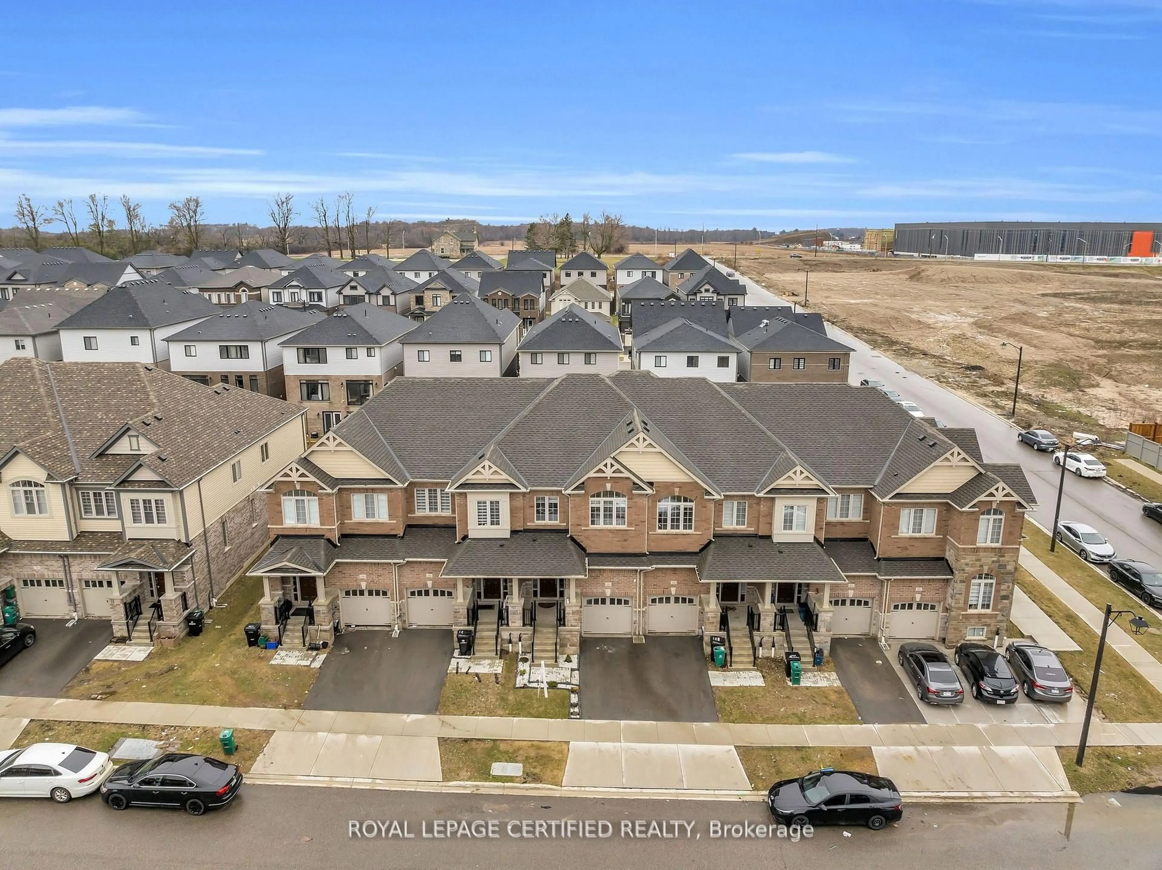 A pic from outside/outdoor area/front of a property/back of a property/a pic from drone, unknown for 66 Grassbourne Ave, Kitchener Ontario N2R 0S5