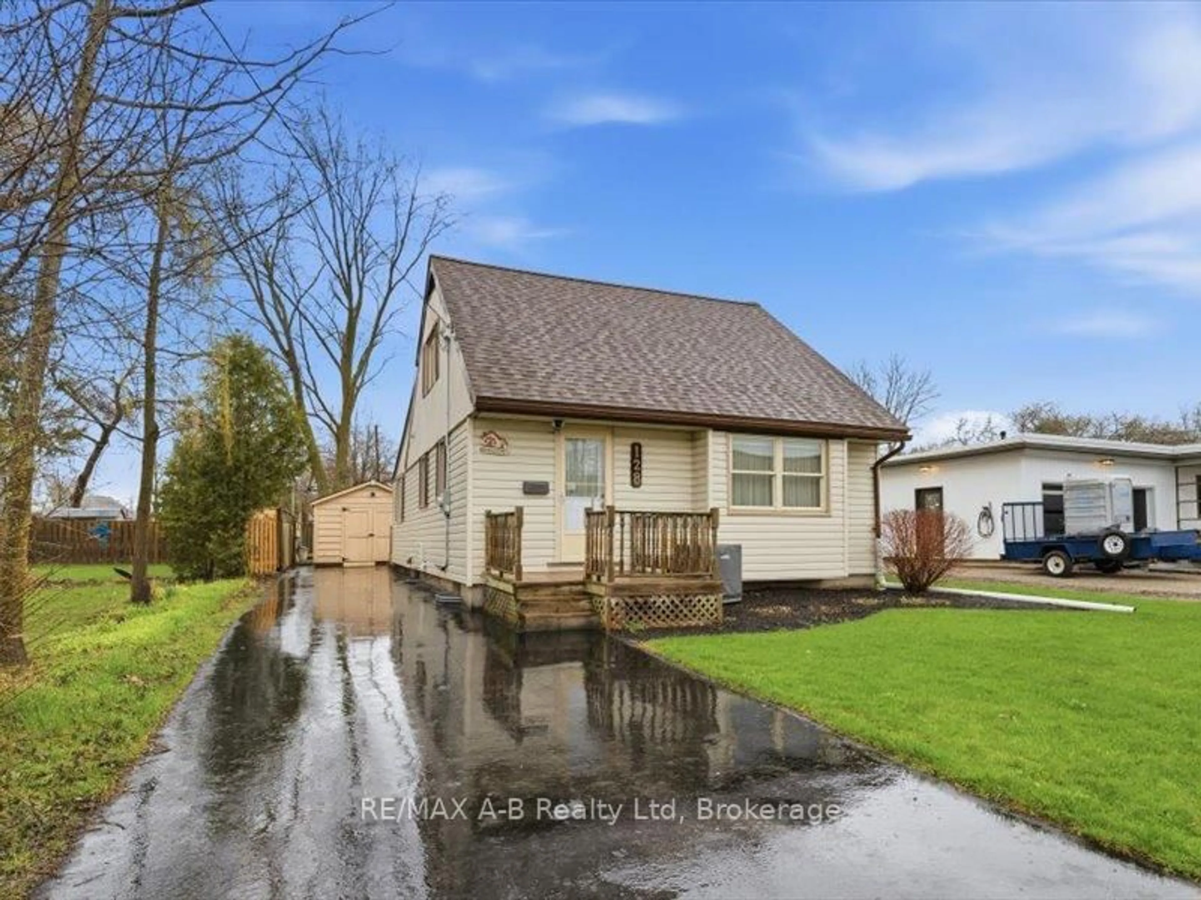 Home with vinyl exterior material, street for 128 Louise St, Stratford Ontario N5A 2E5