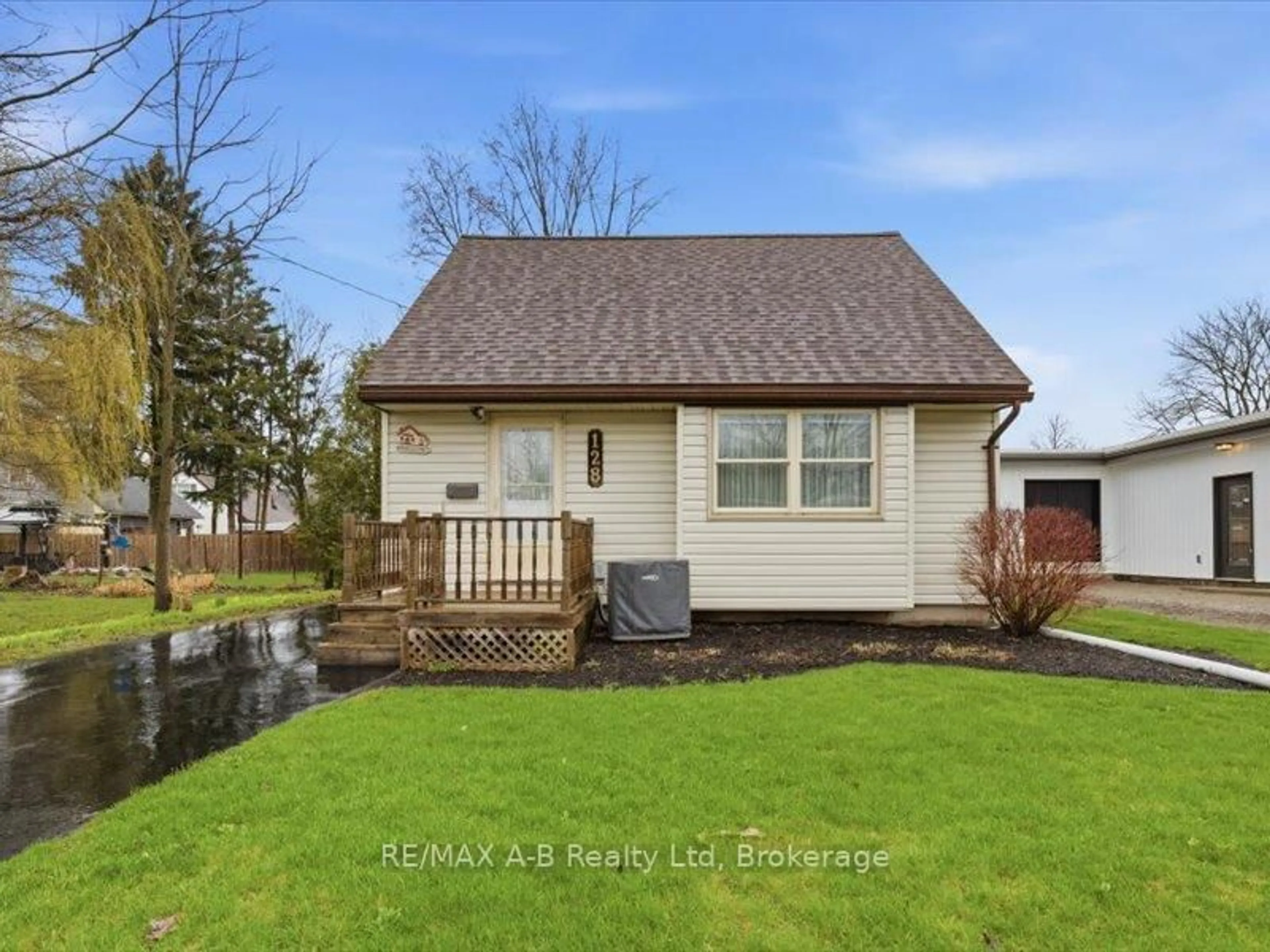 Home with vinyl exterior material, street for 128 Louise St, Stratford Ontario N5A 2E5