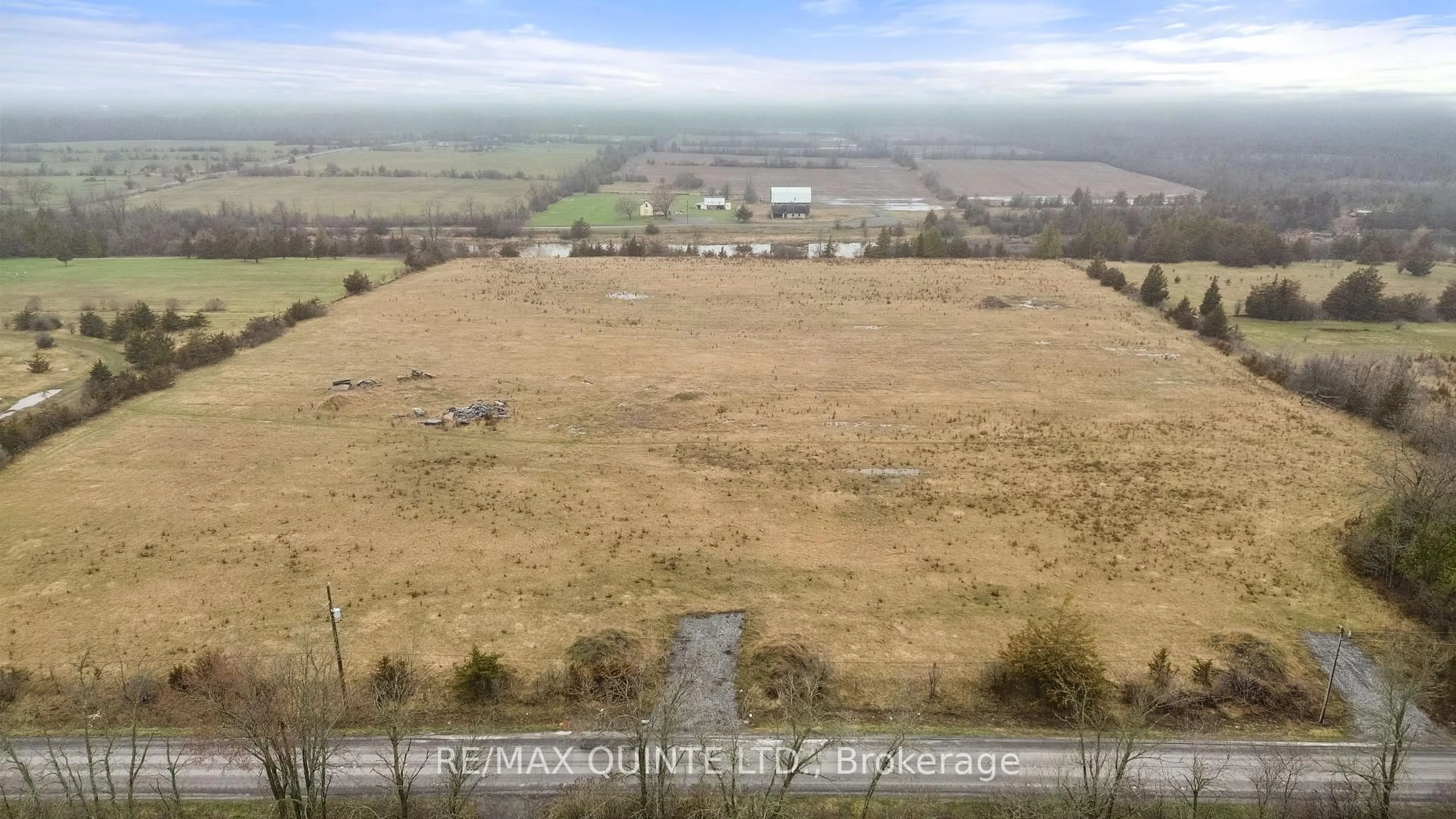 A pic from outside/outdoor area/front of a property/back of a property/a pic from drone, mountain view for 1214 Salem Rd, Prince Edward County Ontario K0K 1T0