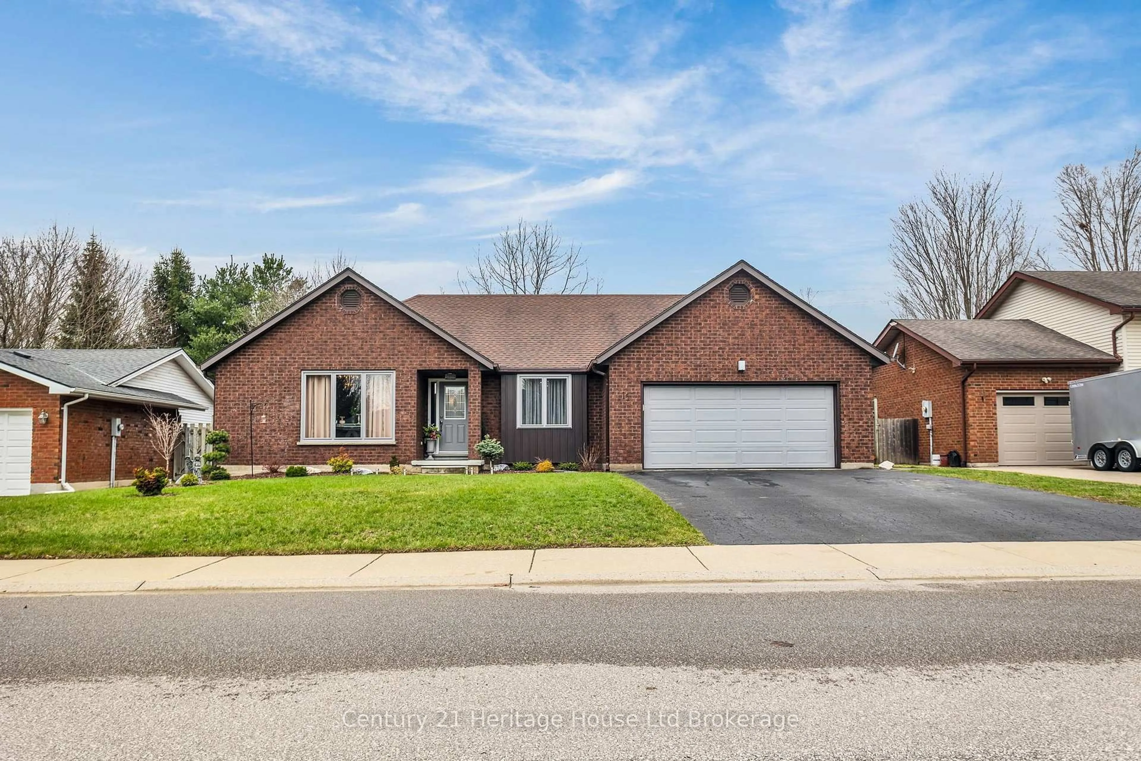 Home with brick exterior material, street for 15 Gibson Dr, Tillsonburg Ontario N4G 5G4