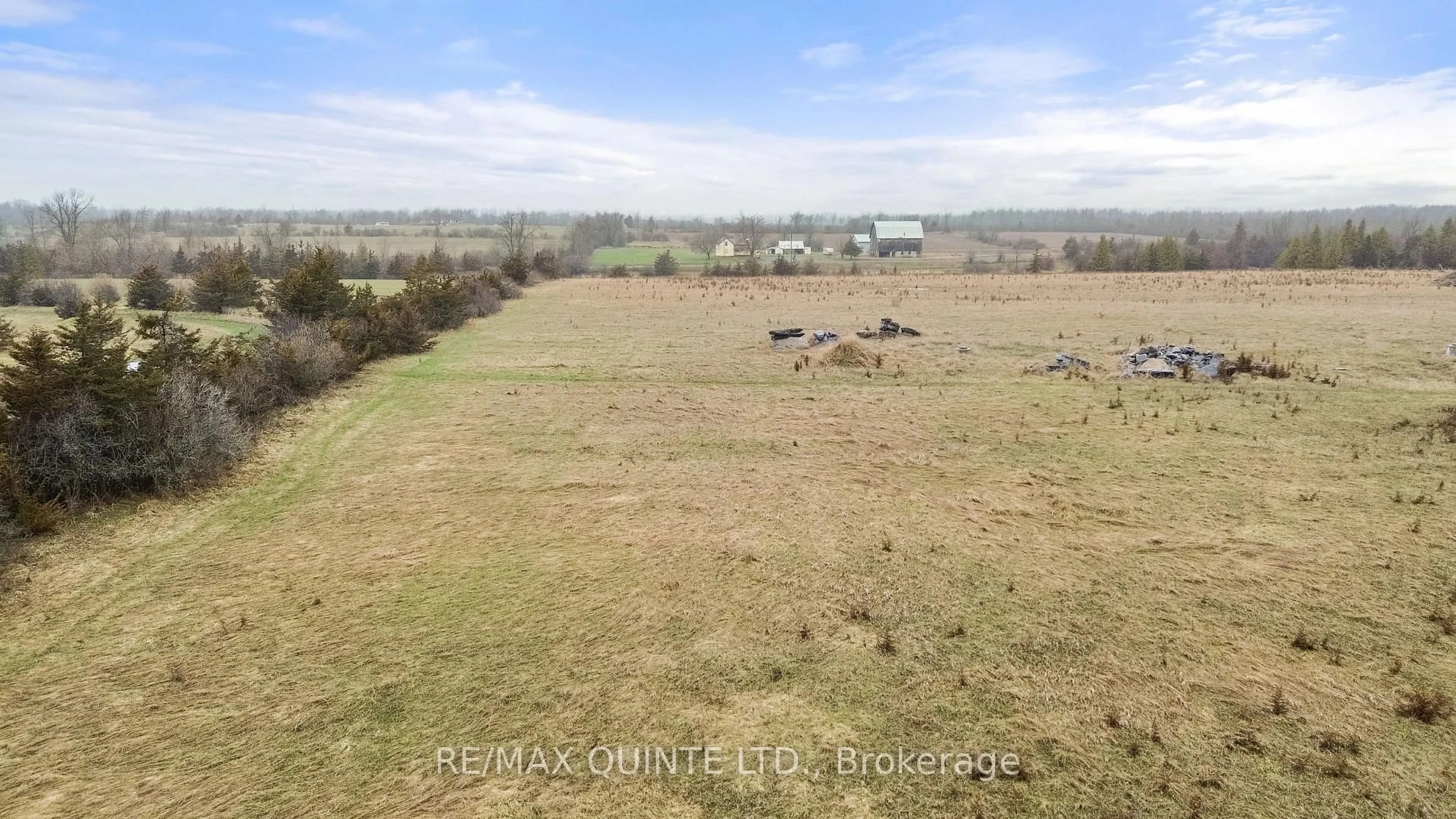 A pic from outside/outdoor area/front of a property/back of a property/a pic from drone, water/lake/river/ocean view for 1230 Salem Rd, Prince Edward County Ontario K0K 1T0