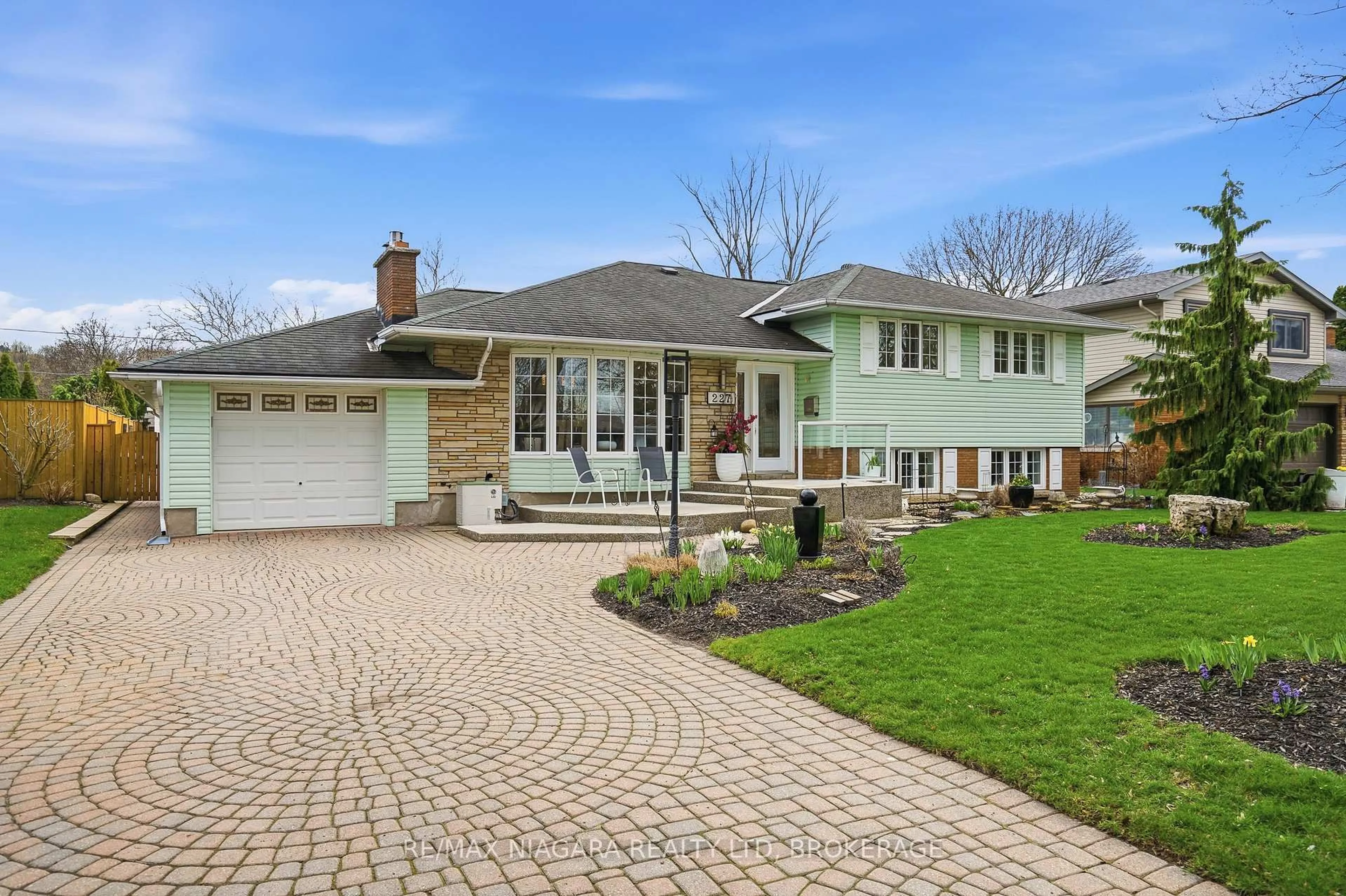 Home with brick exterior material, street for 227 Riverview Blvd, St. Catharines Ontario L2T 3N2