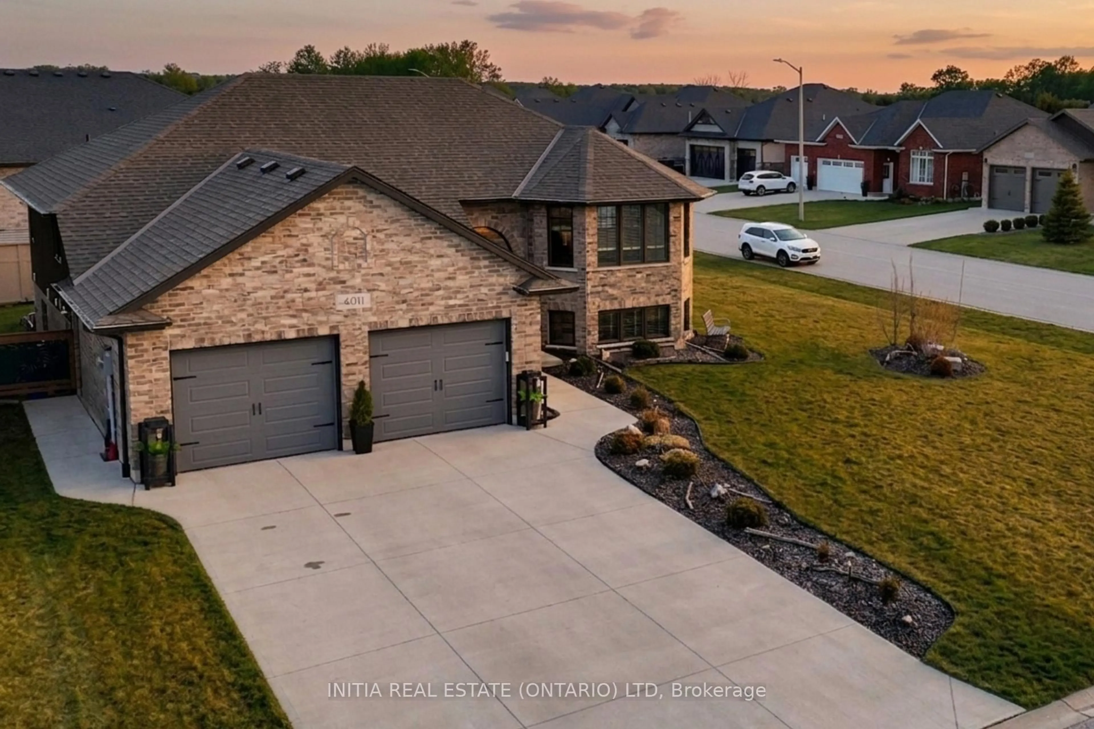 A pic from outside/outdoor area/front of a property/back of a property/a pic from drone, street for 4011 Englehart Dr, Petrolia Ontario N0N 1R0