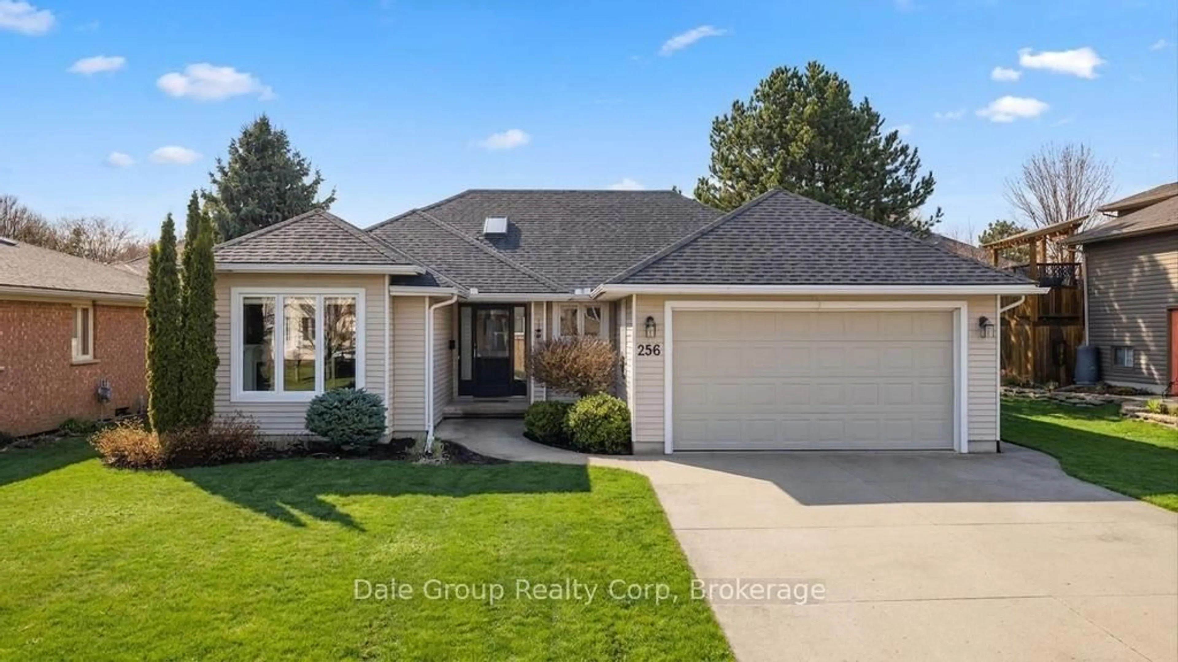 Home with brick exterior material, street for 256 Rivers Blvd, South Huron Ontario N0M 1S1