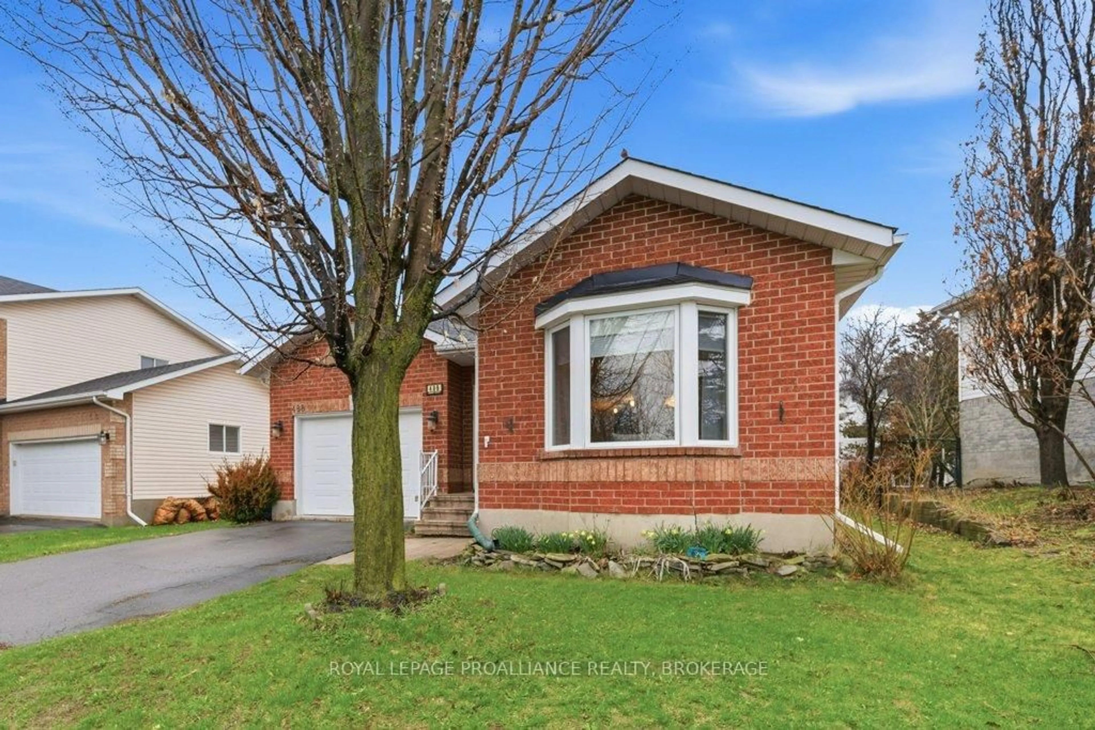 Home with brick exterior material, street for 488 Fieldstone Dr, Kingston Ontario K7K 7E5