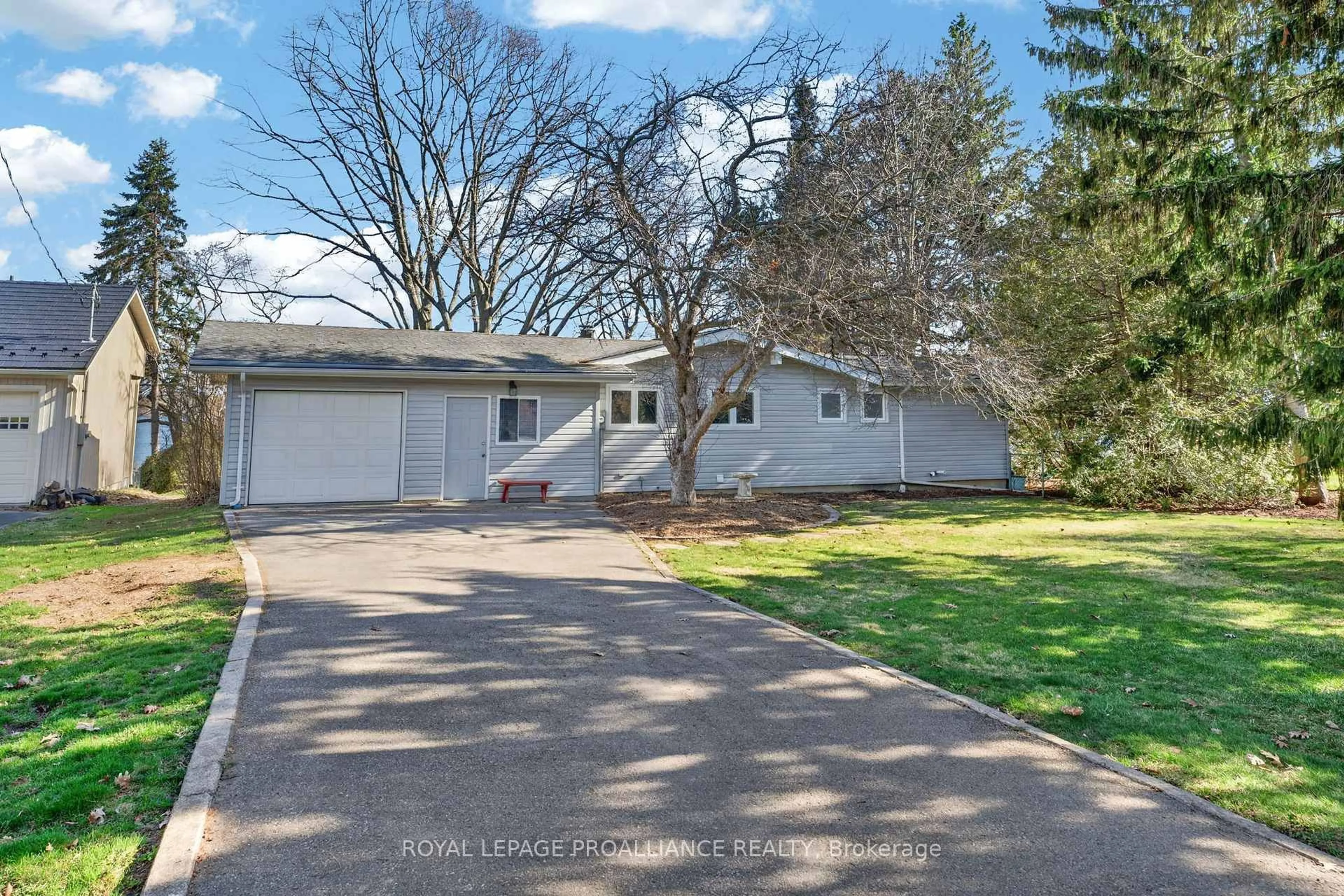 A pic from outside/outdoor area/front of a property/back of a property/a pic from drone, street for 482 Island Rd, Prince Edward County Ontario K0K 2T0