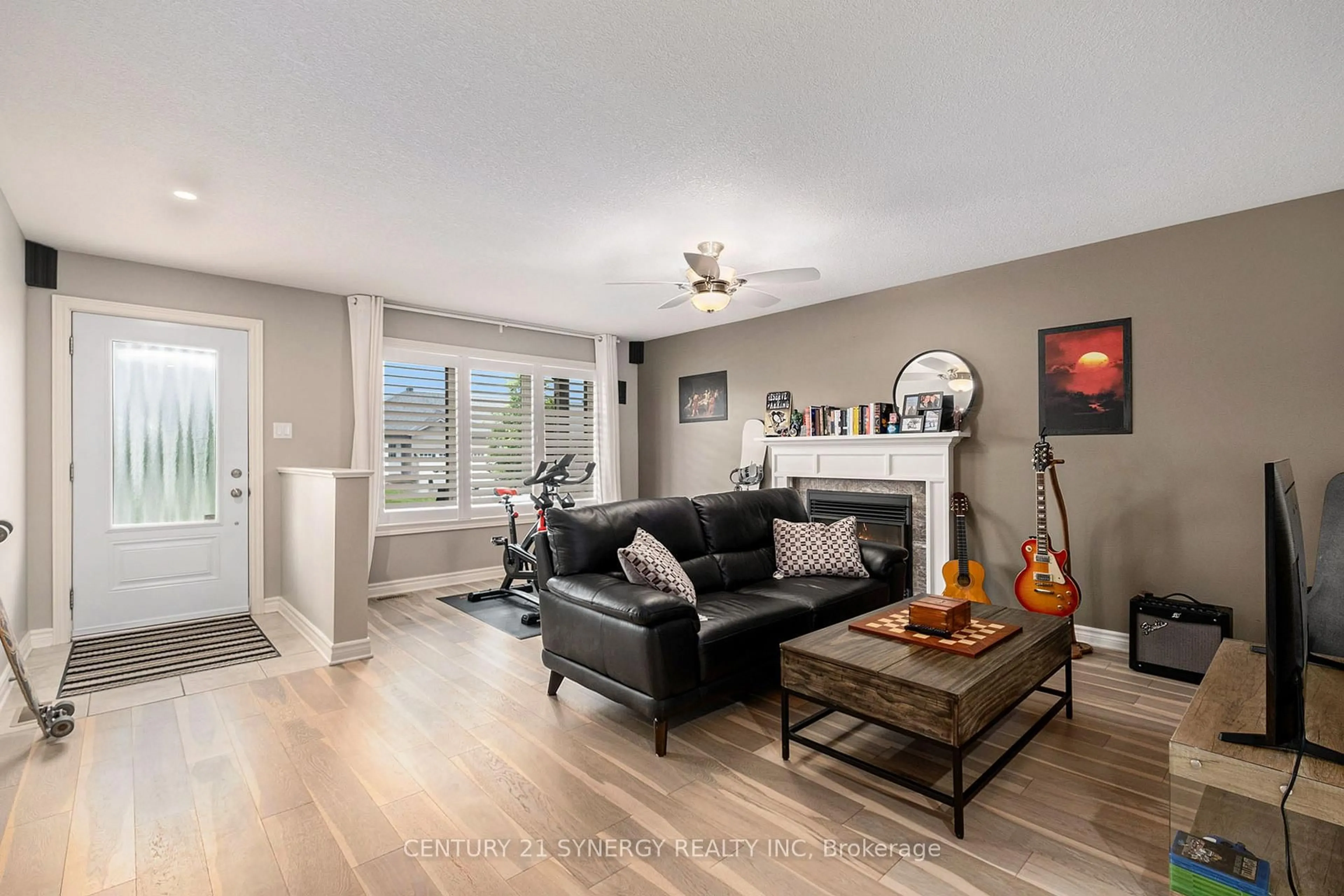 Living room with furniture, wood/laminate floor for 457 Honeyborne St, Almonte Ontario K0A 1A0