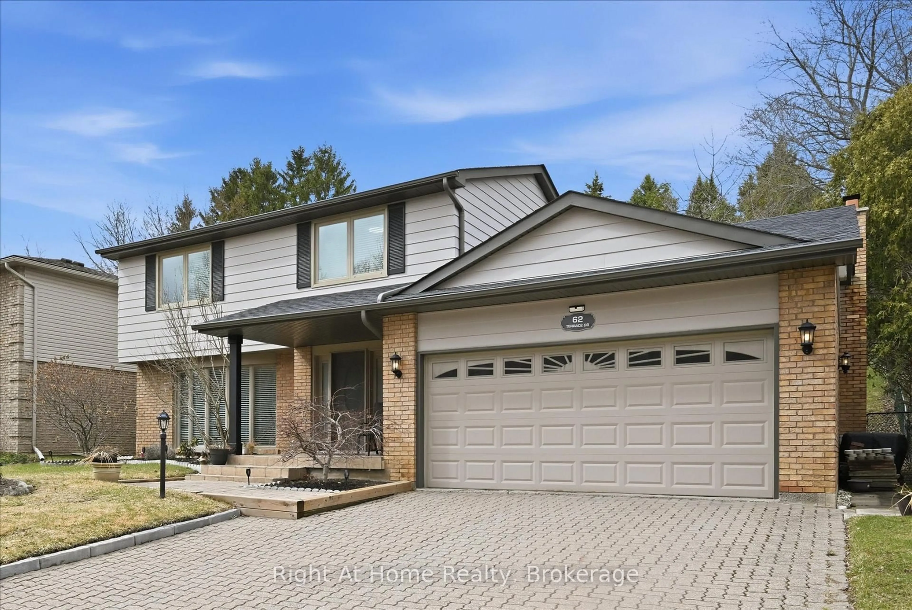 Home with brick exterior material, street for 62 Terrace Dr, Hamilton Ontario L9H 3X2