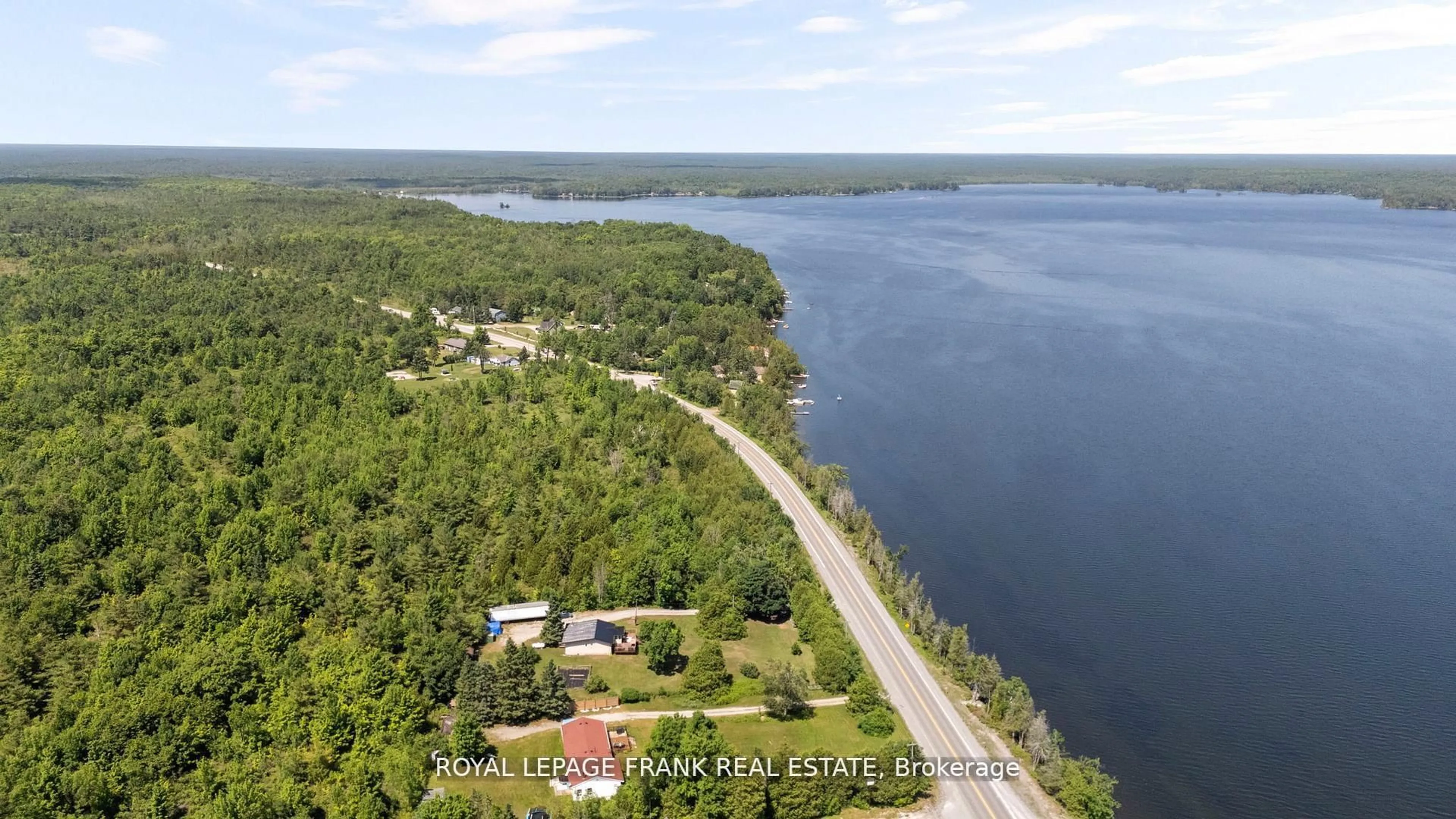A pic from outside/outdoor area/front of a property/back of a property/a pic from drone, water/lake/river/ocean view for 2378 Monck Rd, Kawartha Lakes Ontario K0M 2B0