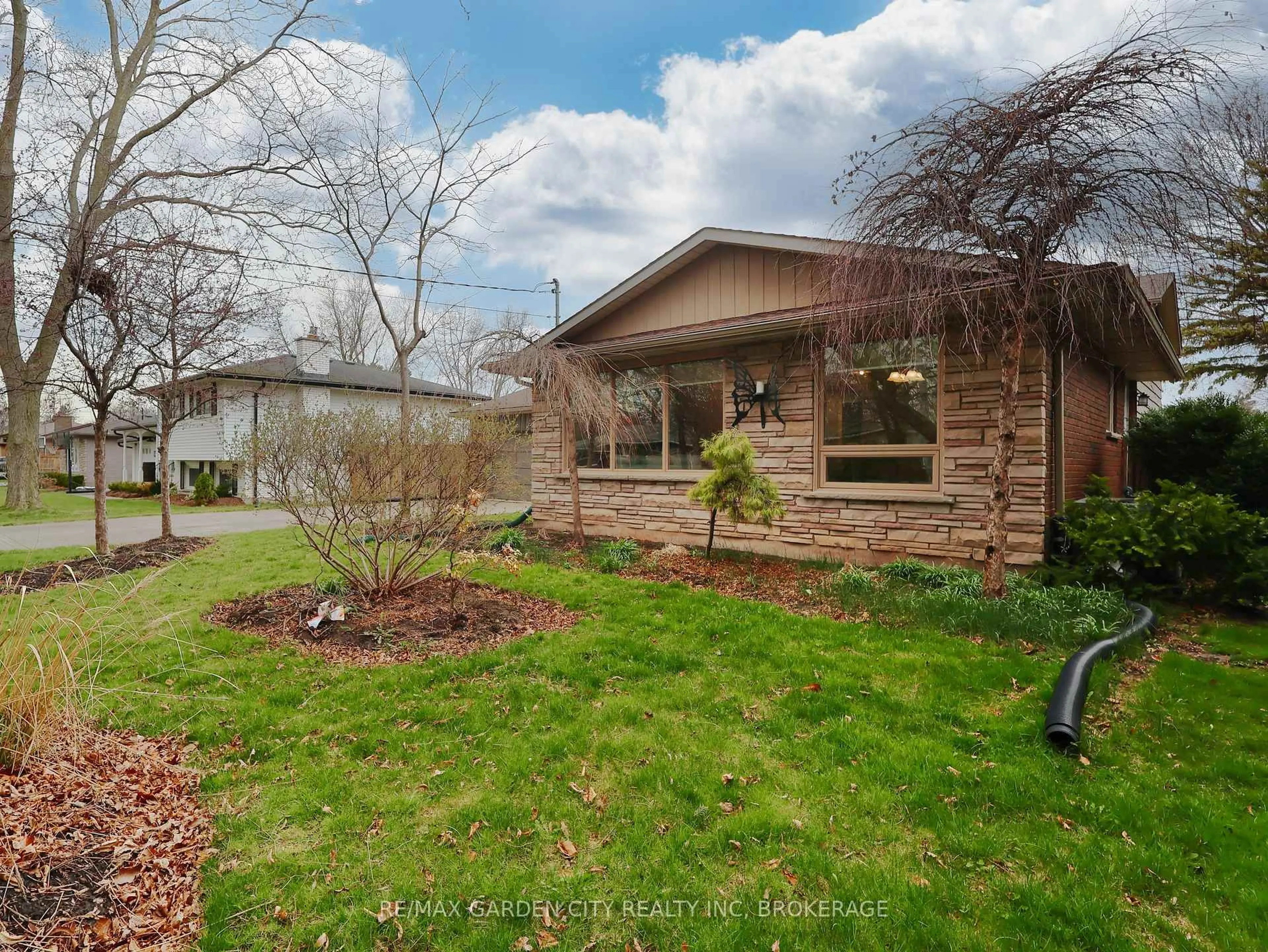 Home with brick exterior material, street for 15 Black Friars Rd, St. Catharines Ontario L2N 2M8