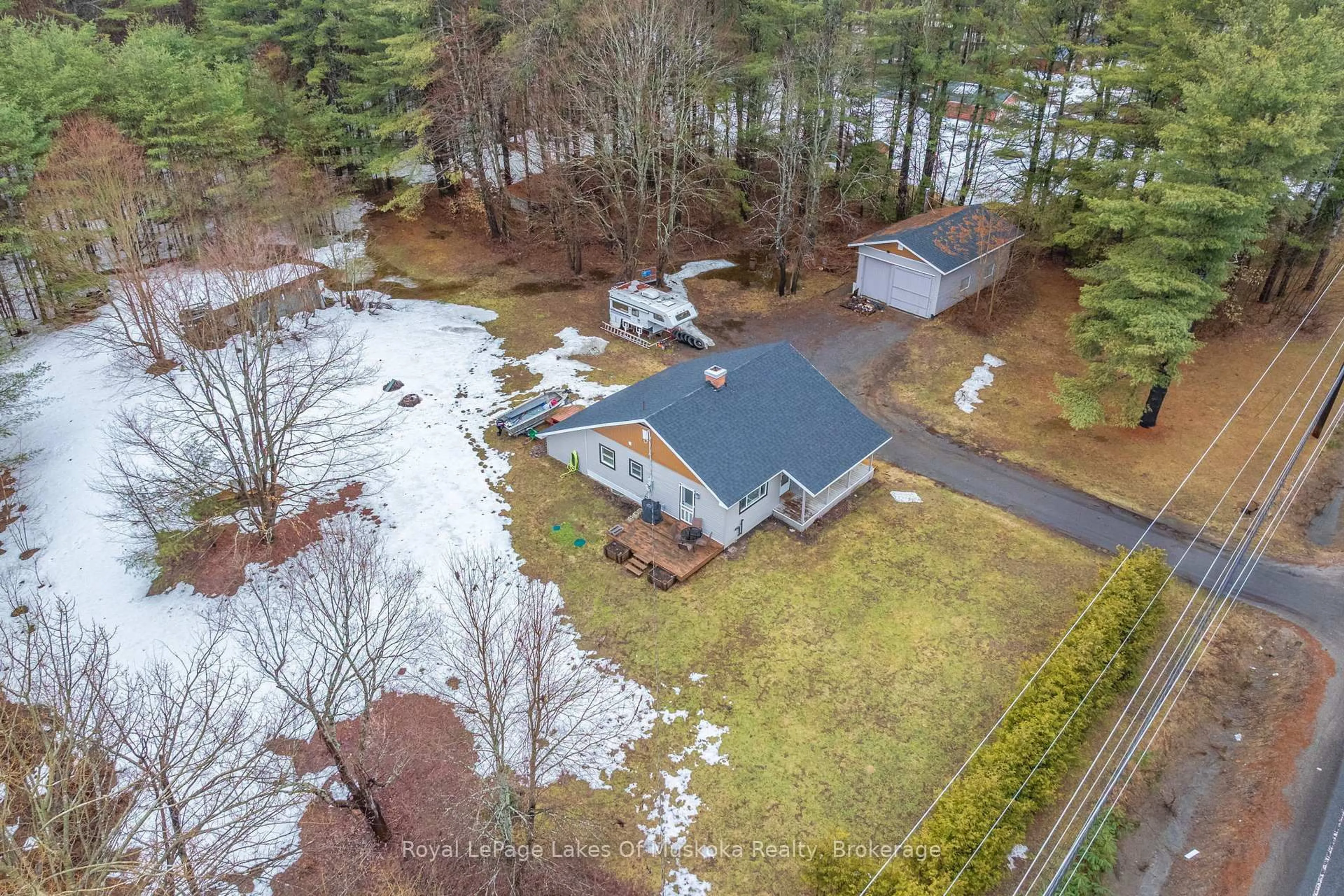 A pic from outside/outdoor area/front of a property/back of a property/a pic from drone, water/lake/river/ocean view for 1150 Manitoba St, Bracebridge Ontario P1L 0K8
