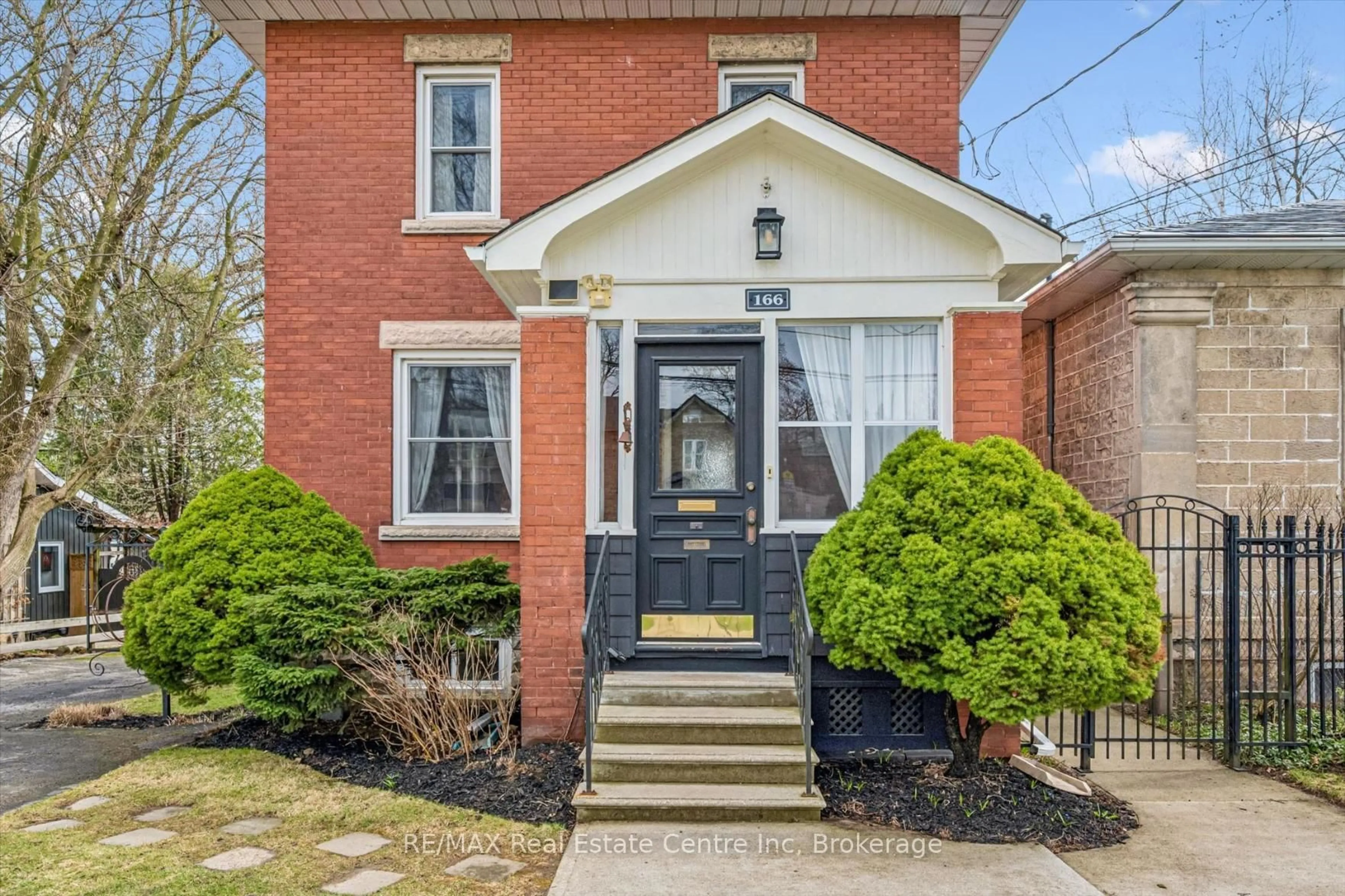 Home with brick exterior material, street for 166 WATERLOO Ave, Guelph Ontario N1H 3J1