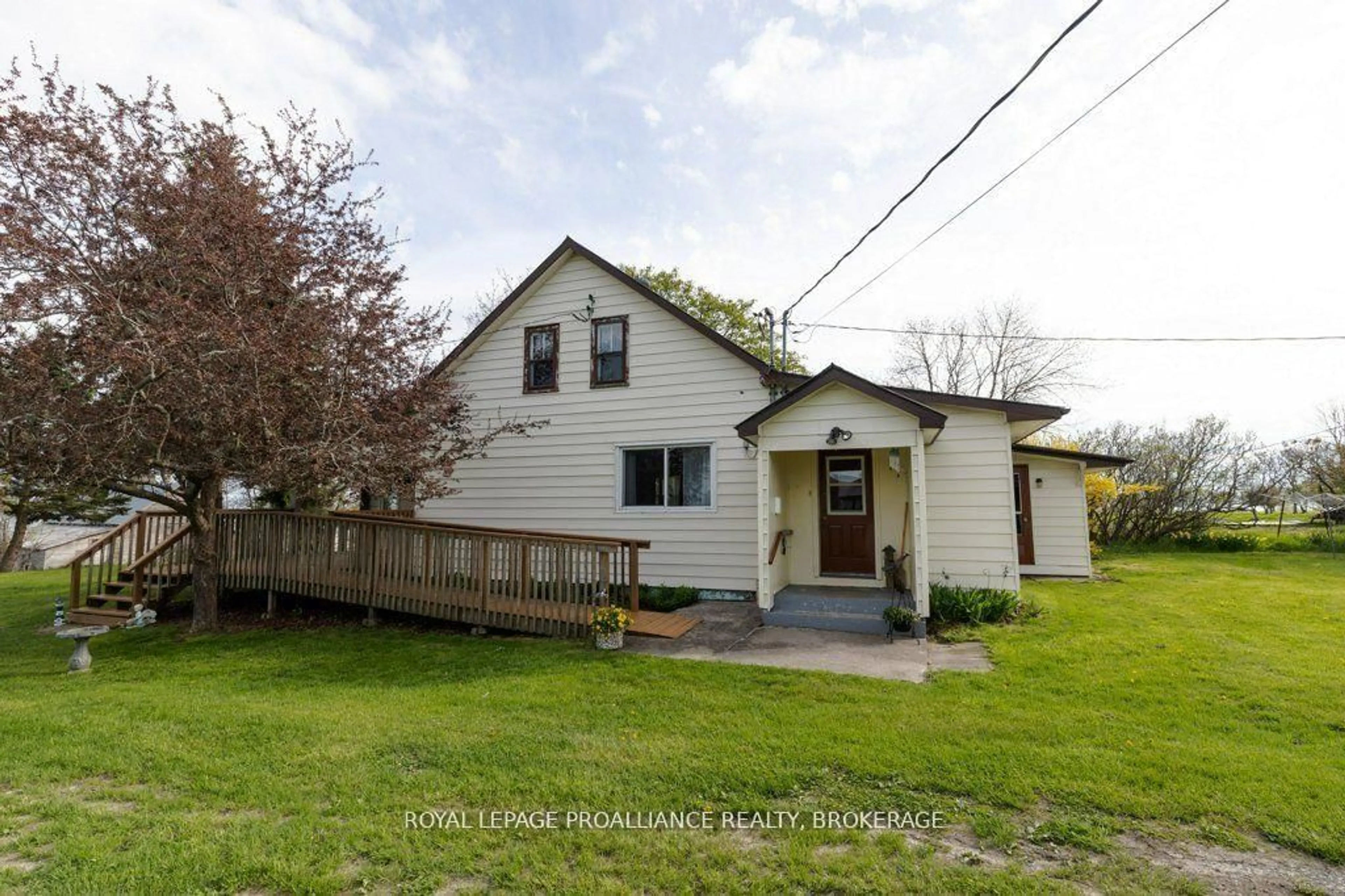 A pic from outside/outdoor area/front of a property/back of a property/a pic from drone, street for 39 Fisherman's Cove Lane, Wolfe Island Ontario K0H 2Y0