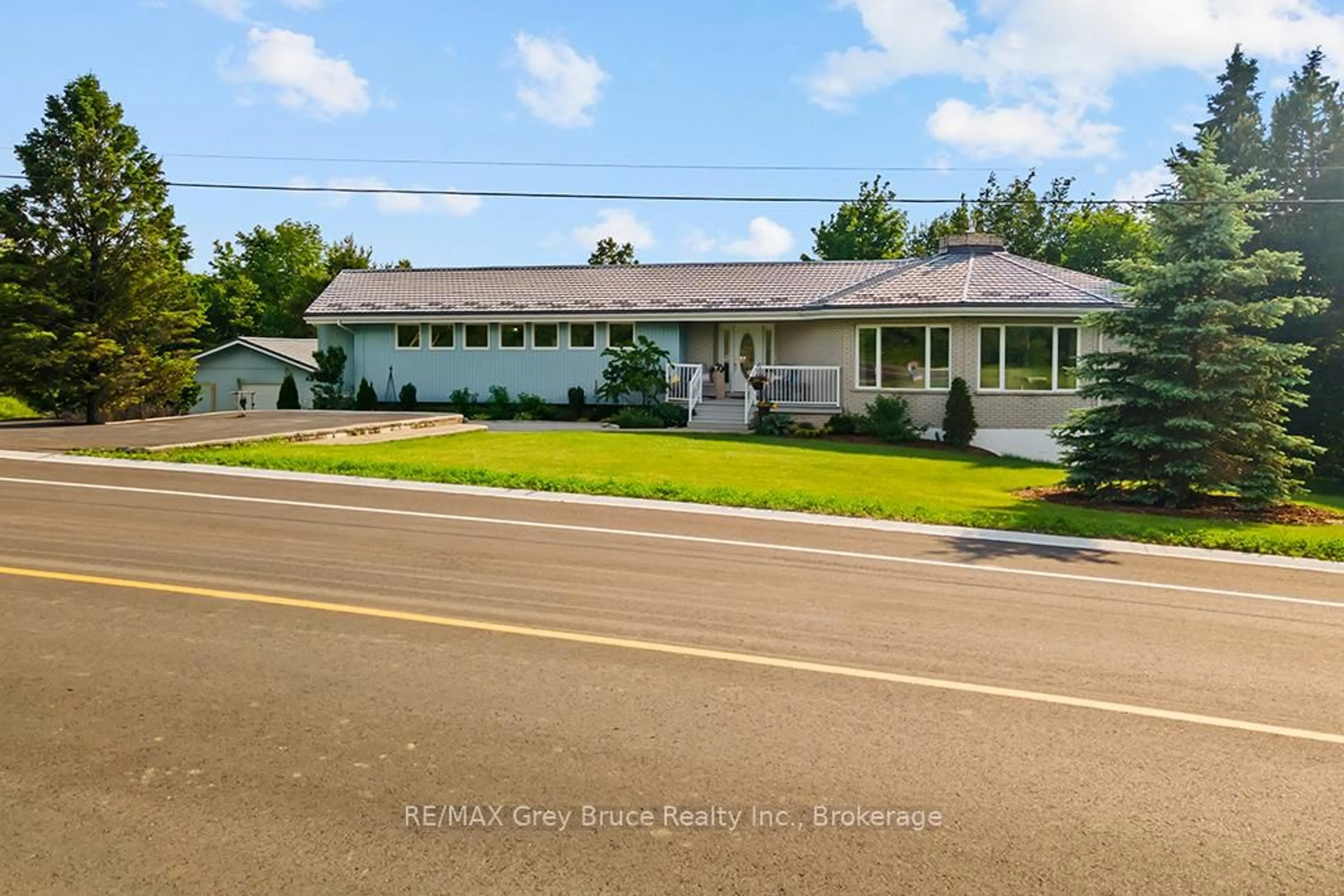 A pic from outside/outdoor area/front of a property/back of a property/a pic from drone, street for 15 Isthmus bay Rd, Northern Bruce Peninsula Ontario N0H 1W0
