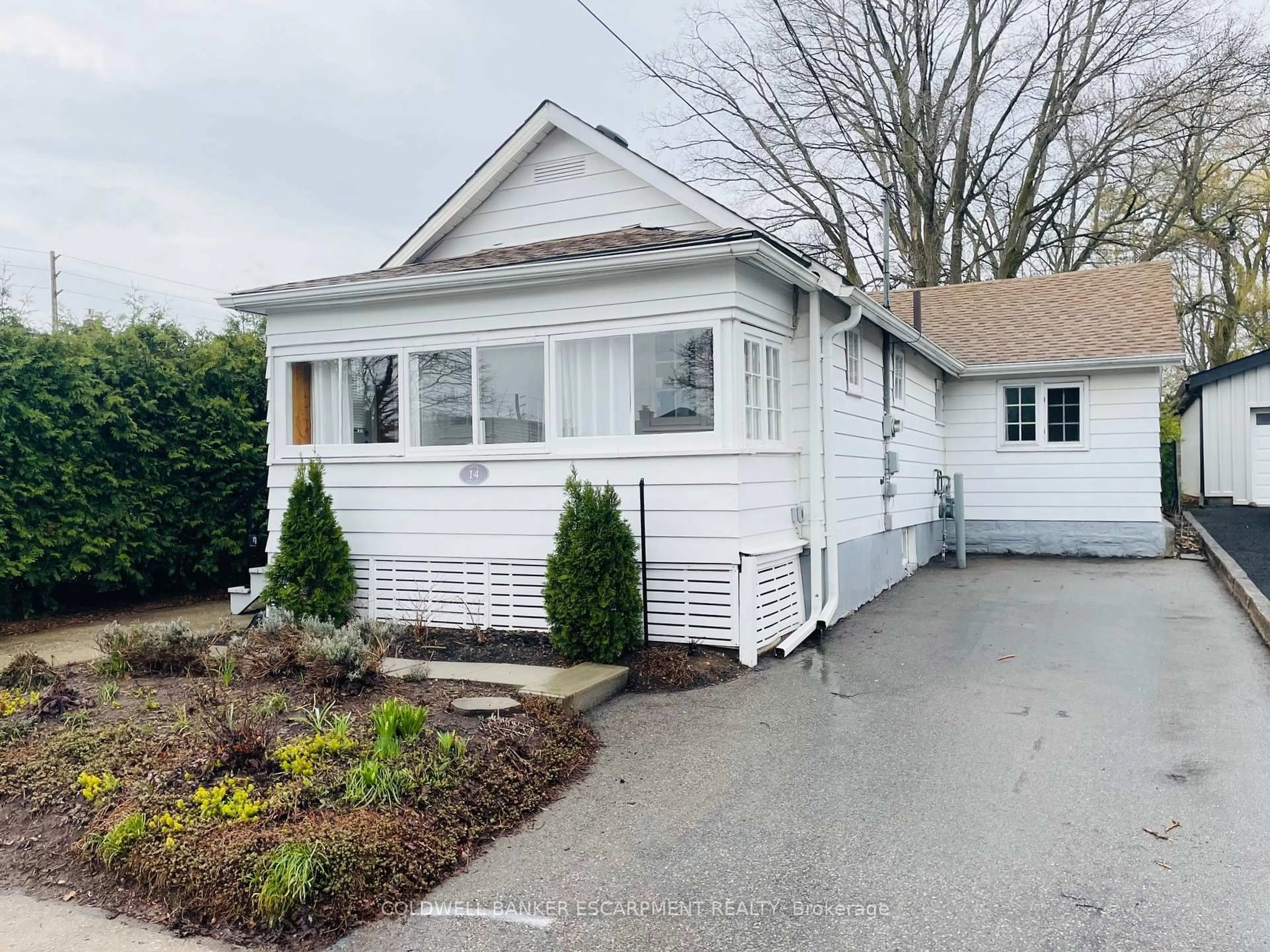 Home with vinyl exterior material, street for 14 Laurine Ave, Guelph Ontario N1E 4M9