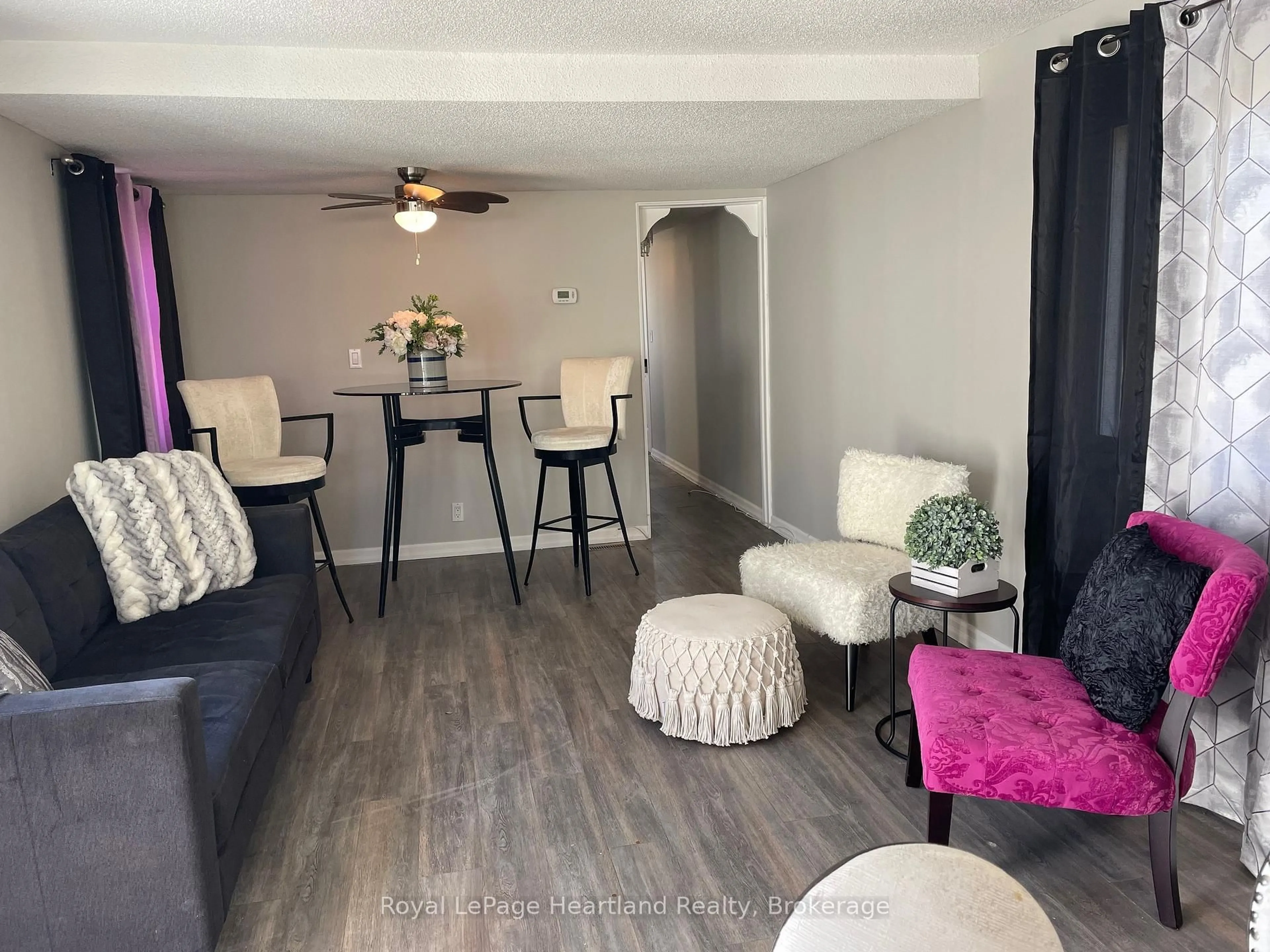 Living room with furniture, wood/laminate floor for 21 RUTH St, Ashfield-Colborne-Wawanosh Ontario N7A 3Y3