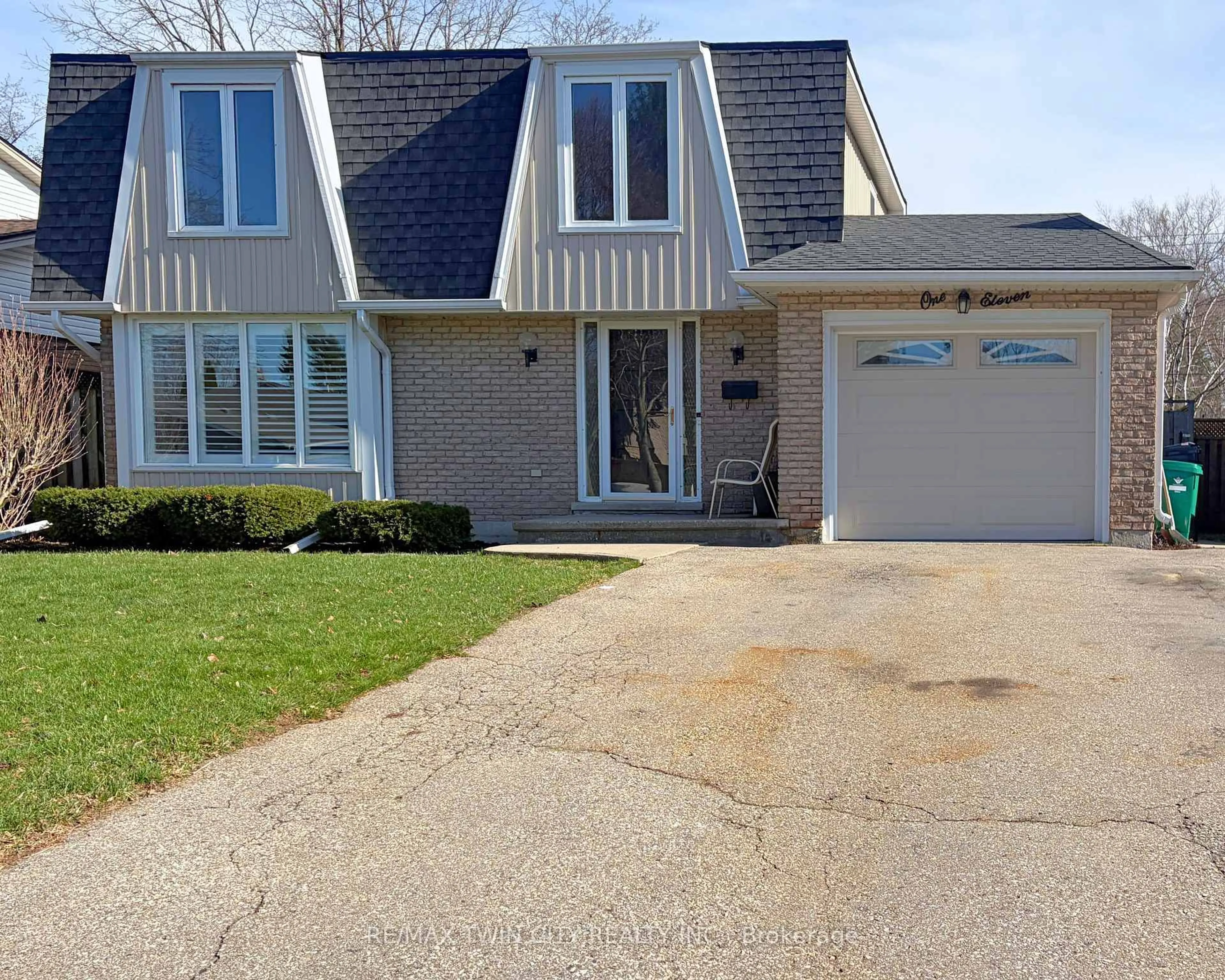 Home with vinyl exterior material, street for 111 Manor Dr, Kitchener Ontario N2A 2T9