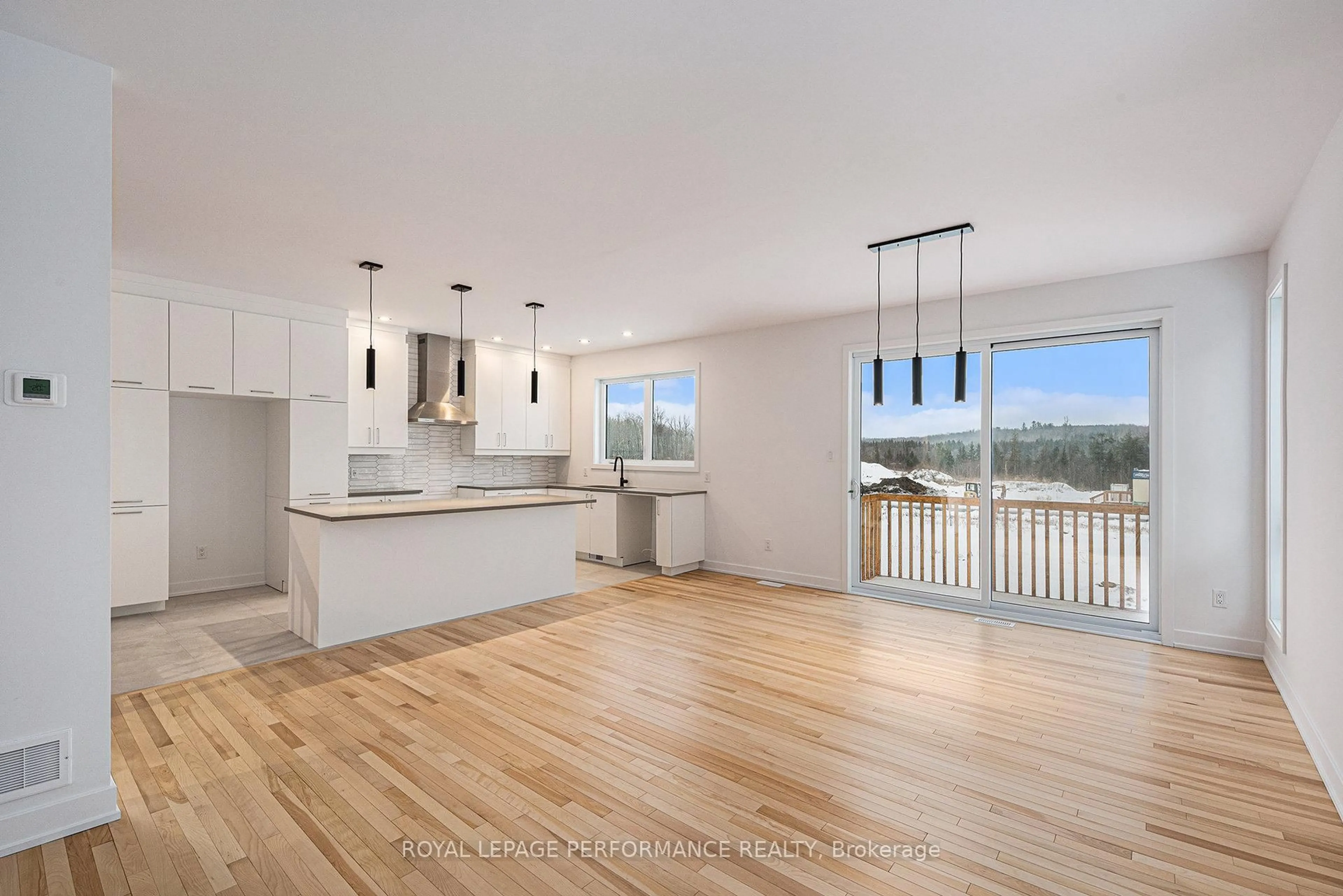 Open concept kitchen, wood/laminate floor for 94 RUTILE St, Clarence-Rockland Ontario K4K 0M6