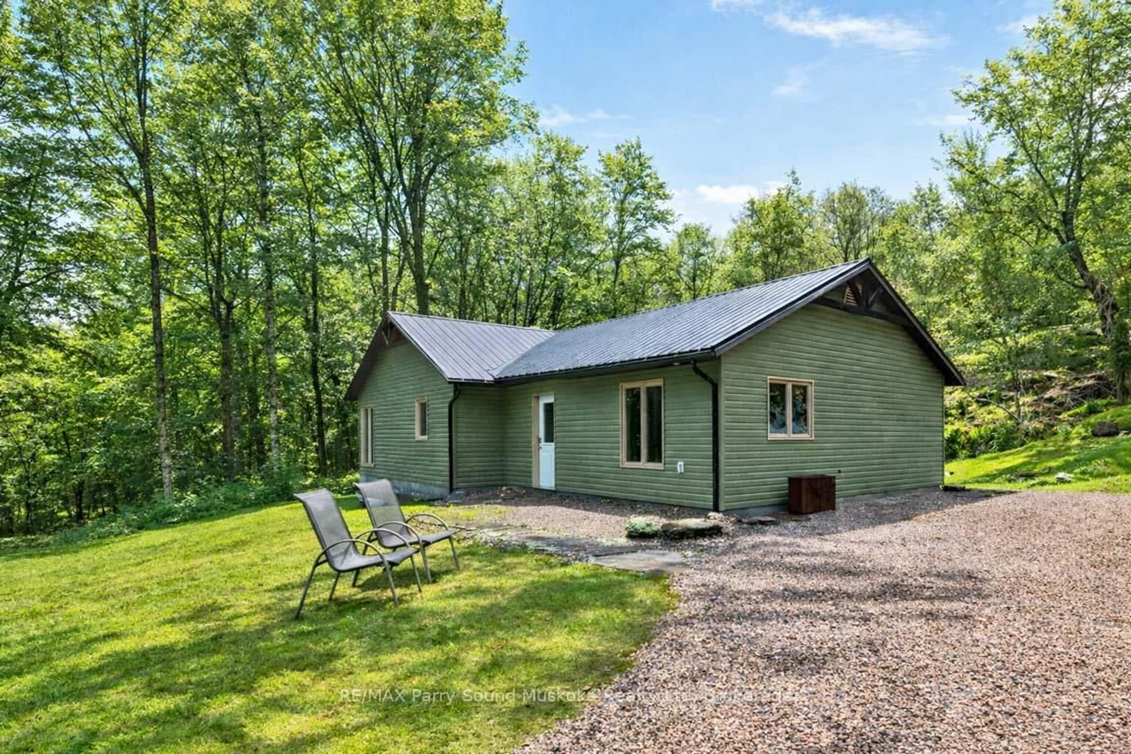 A pic from outside/outdoor area/front of a property/back of a property/a pic from drone, unknown for 64 124 Highway, McDougall Ontario P2A 2W7