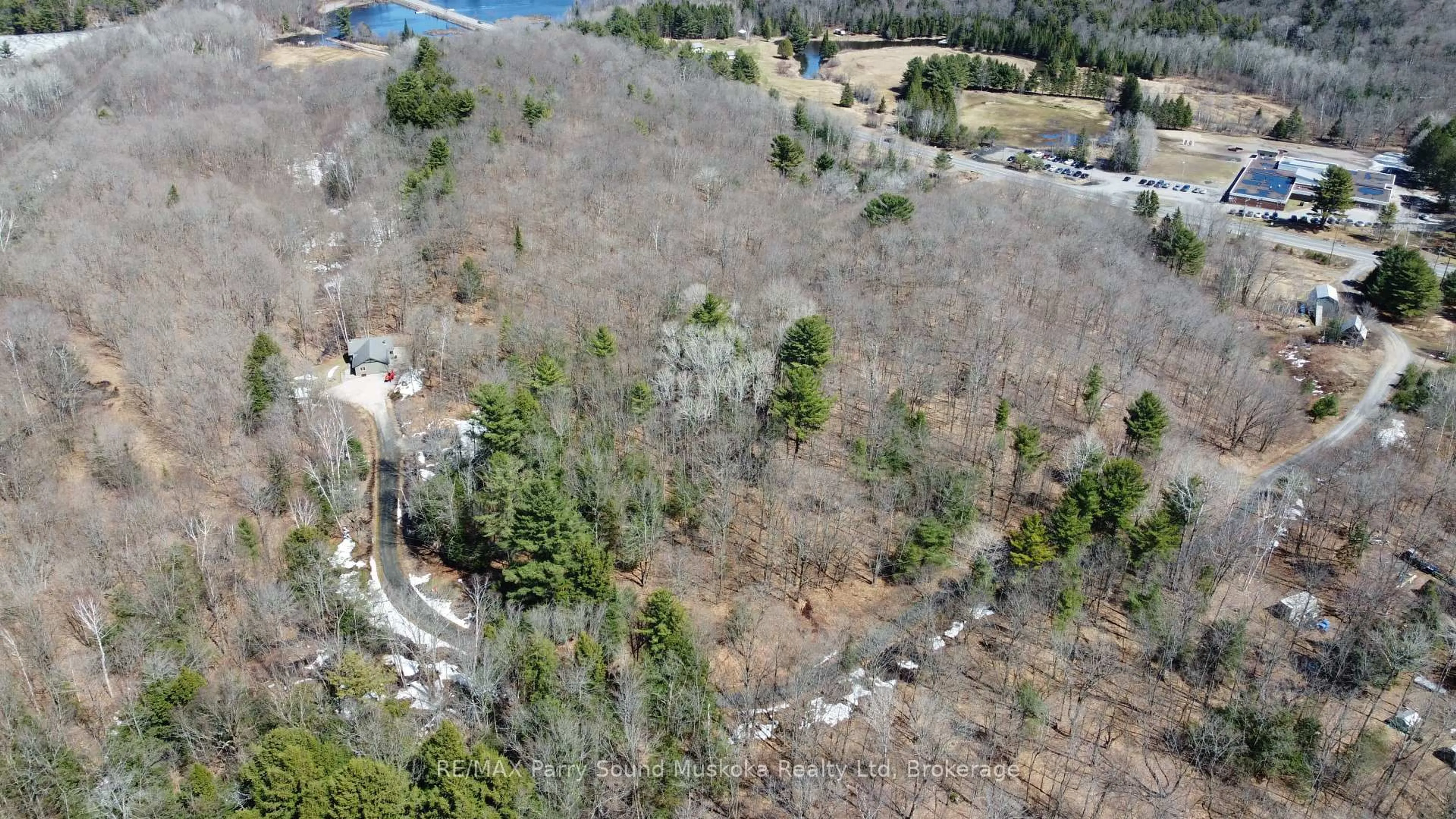 A pic from outside/outdoor area/front of a property/back of a property/a pic from drone, forest/trees view for 64 124 Highway, McDougall Ontario P2A 2W7