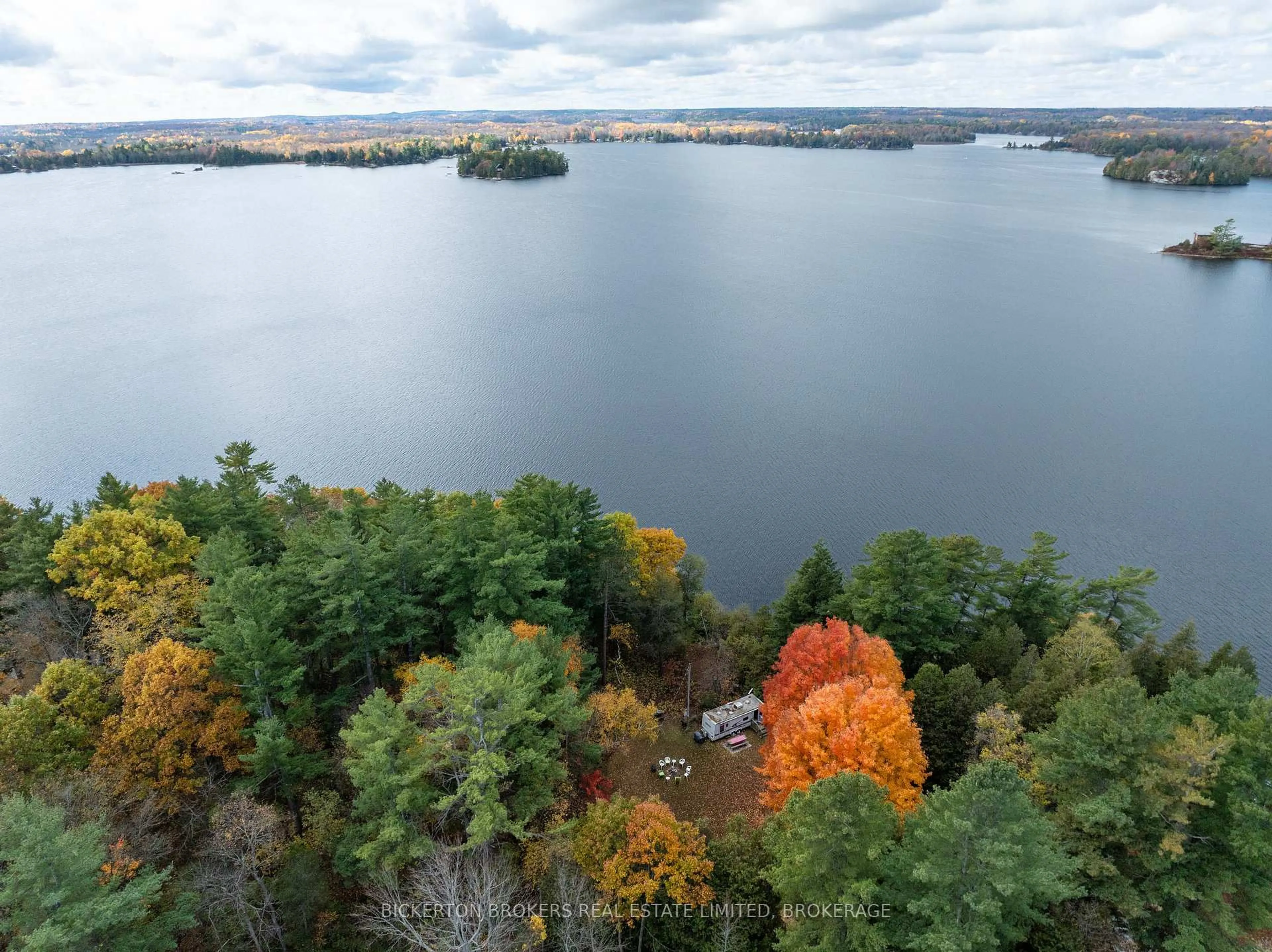 A pic from outside/outdoor area/front of a property/back of a property/a pic from drone, water/lake/river/ocean view for 18 Lake Shore Dr, Rideau Lakes Ontario K0E 1G0