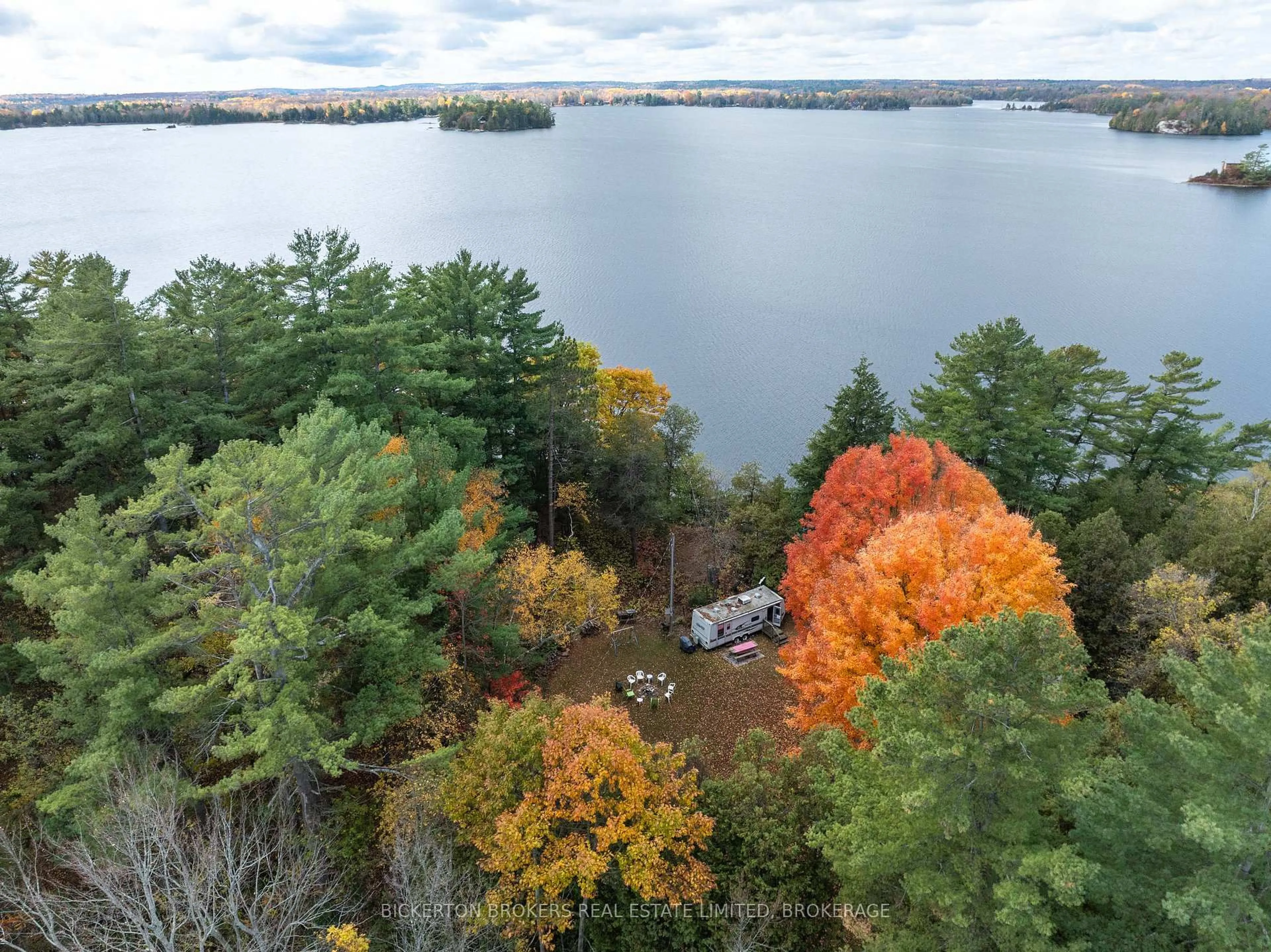 A pic from outside/outdoor area/front of a property/back of a property/a pic from drone, water/lake/river/ocean view for 18 Lake Shore Dr, Rideau Lakes Ontario K0E 1G0