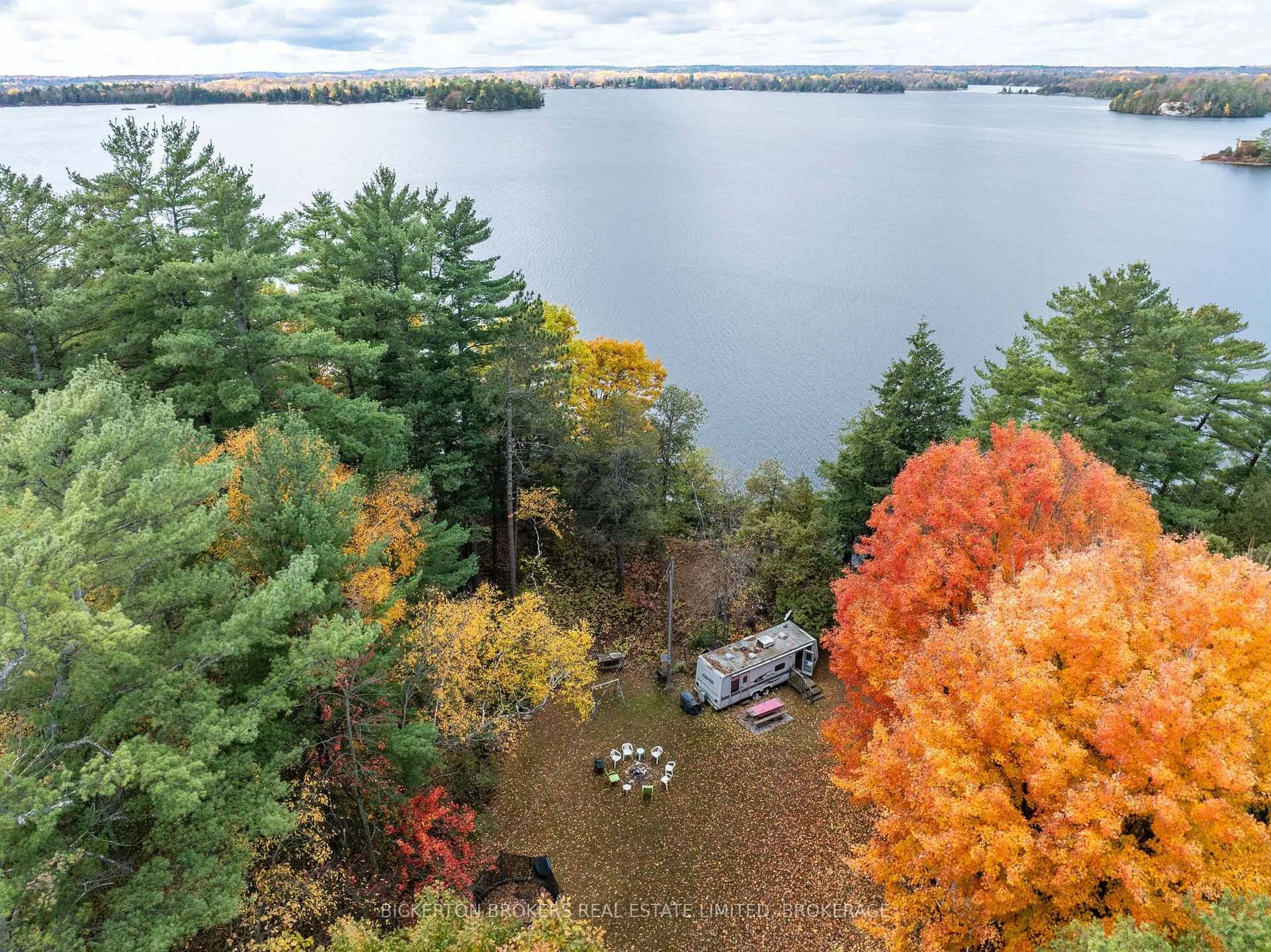 A pic from outside/outdoor area/front of a property/back of a property/a pic from drone, water/lake/river/ocean view for 18 Lake Shore Dr, Rideau Lakes Ontario K0E 1G0