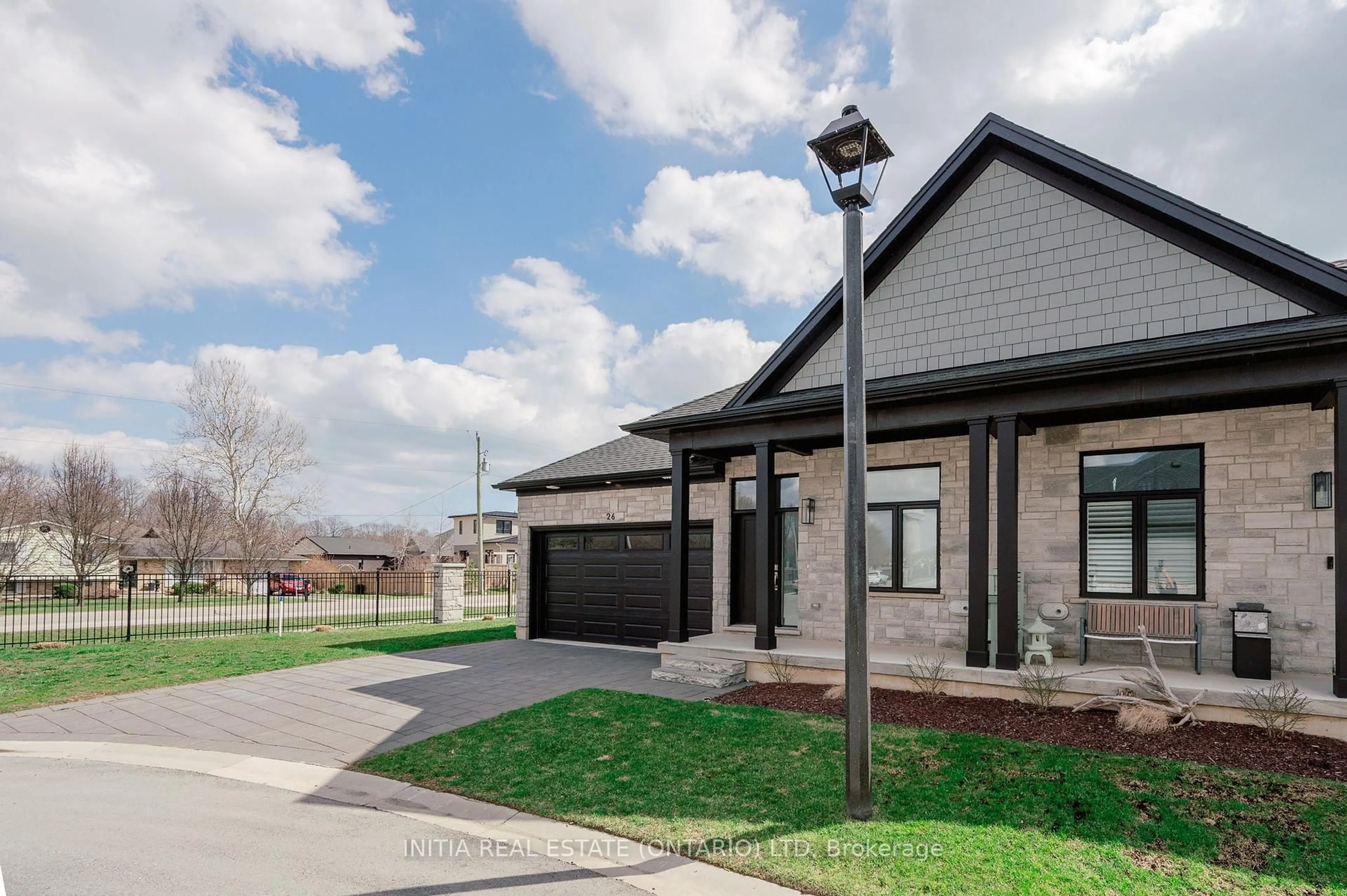 Home with brick exterior material, street for 63 Compass Tr #26, Central Elgin Ontario N5L 0B8