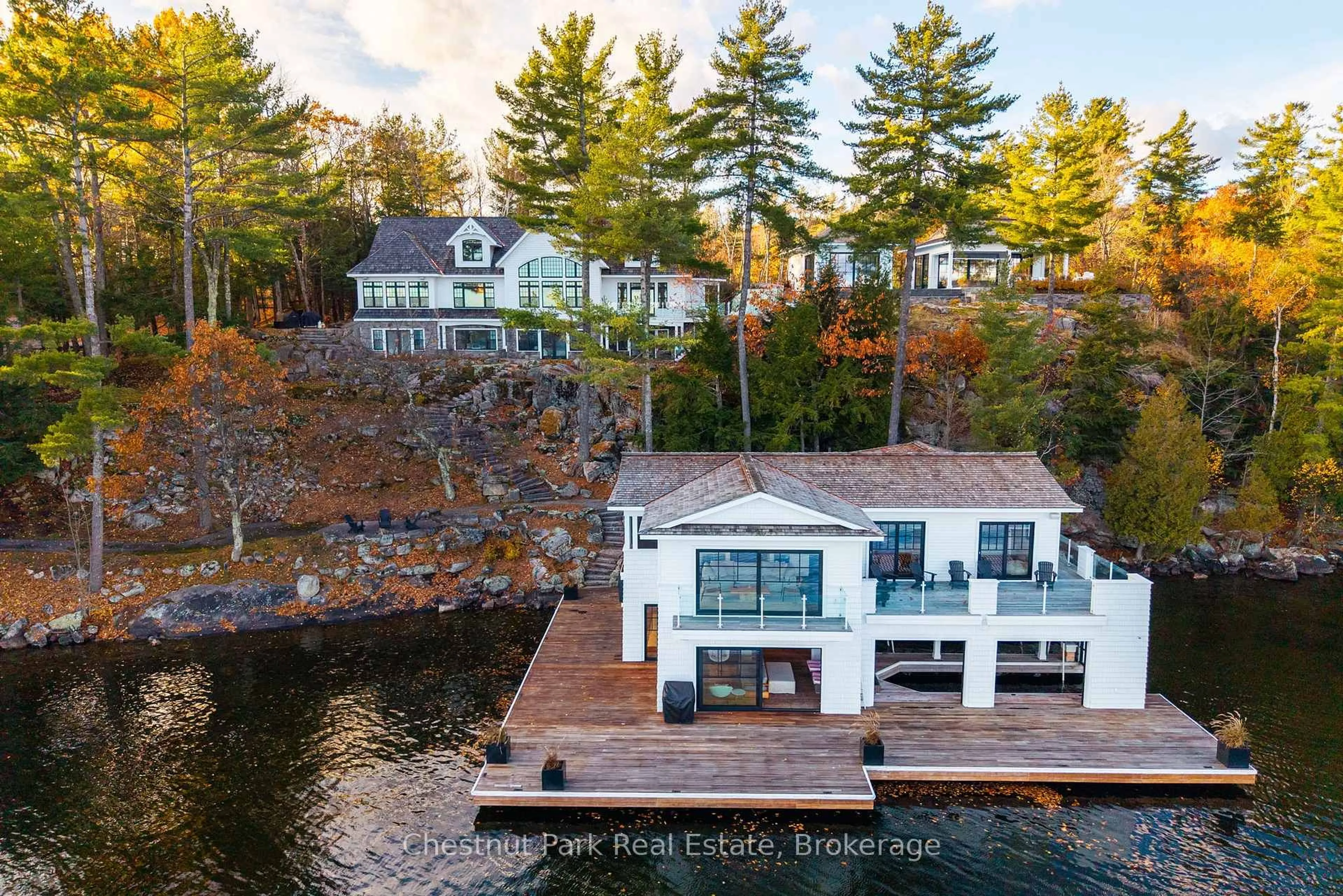 A pic from outside/outdoor area/front of a property/back of a property/a pic from drone, water/lake/river/ocean view for 1023 Oak Bank Point Rd, Muskoka Lakes Ontario P0B 1G0