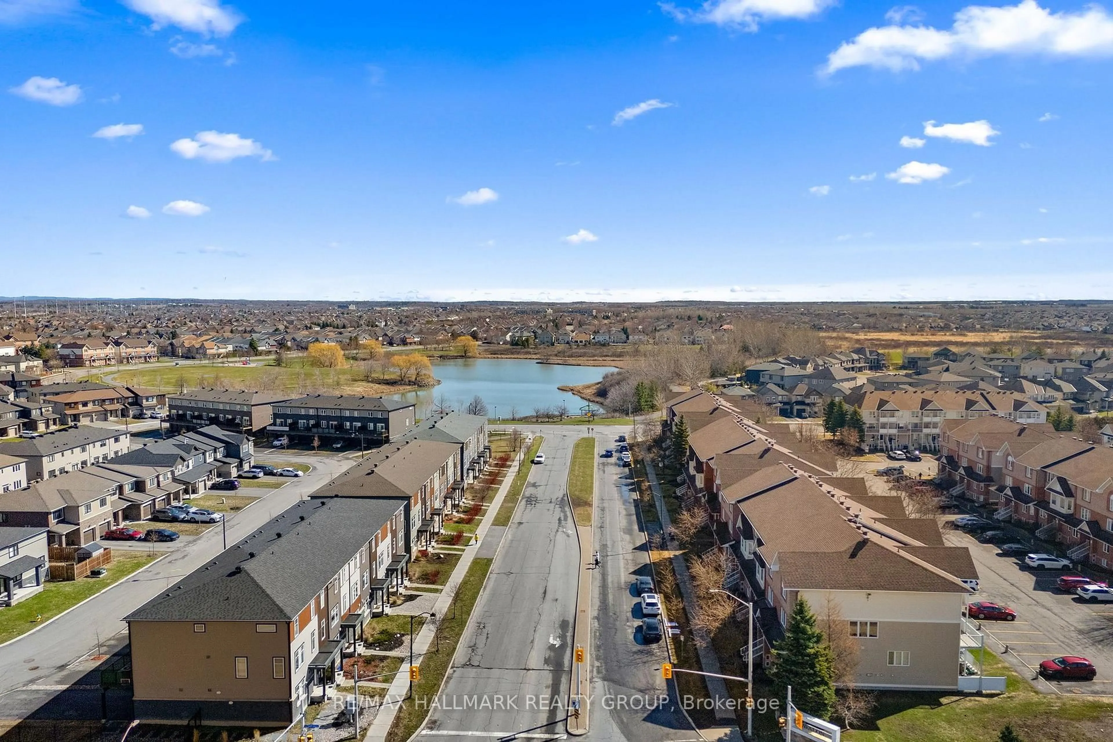 A pic from outside/outdoor area/front of a property/back of a property/a pic from drone, water/lake/river/ocean view for 12 Lakepointe Dr, Orleans Ontario K4A 5E3