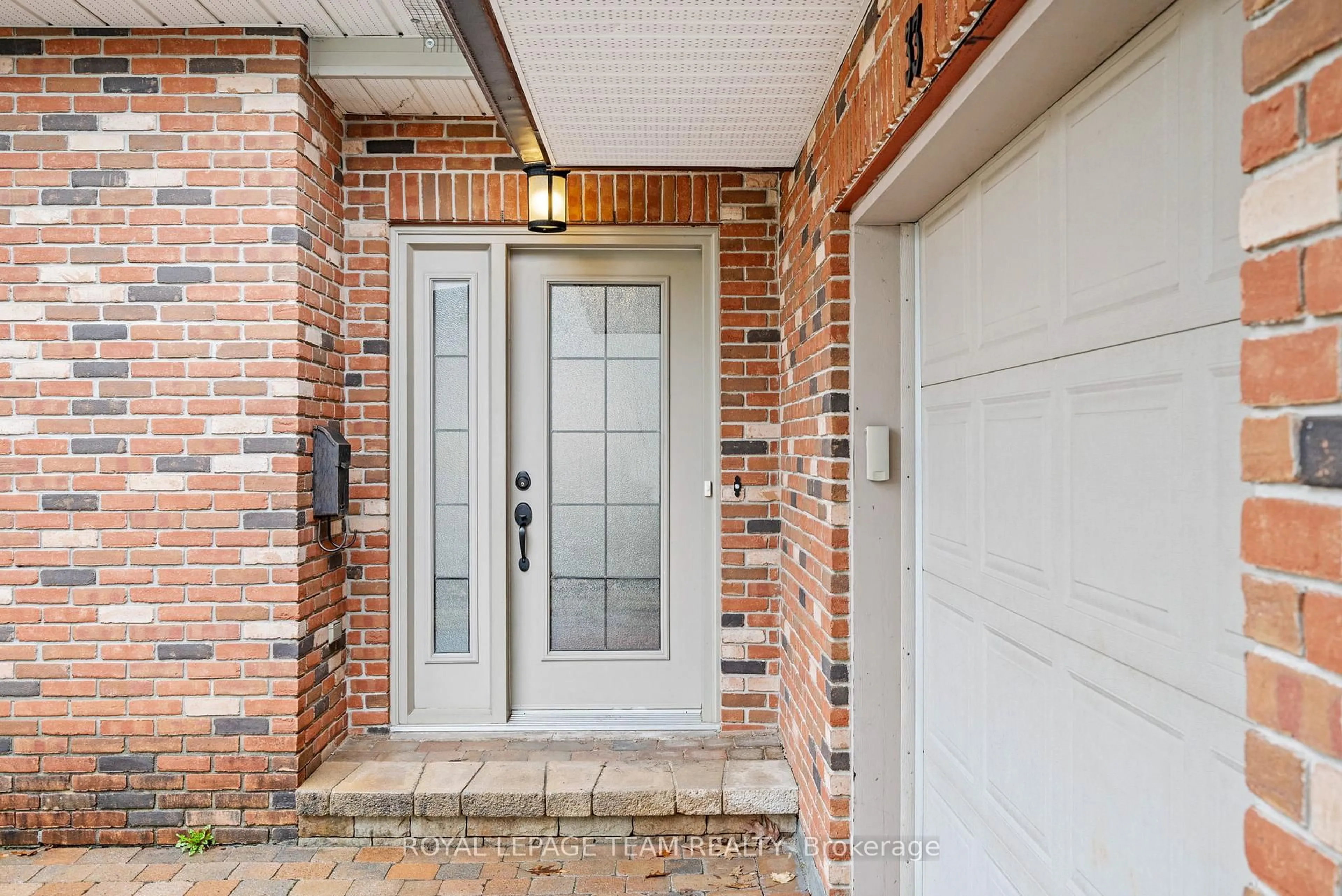 Home with brick exterior material, street for 33 Rutherford Cres, Ottawa Ontario K2K 1N1