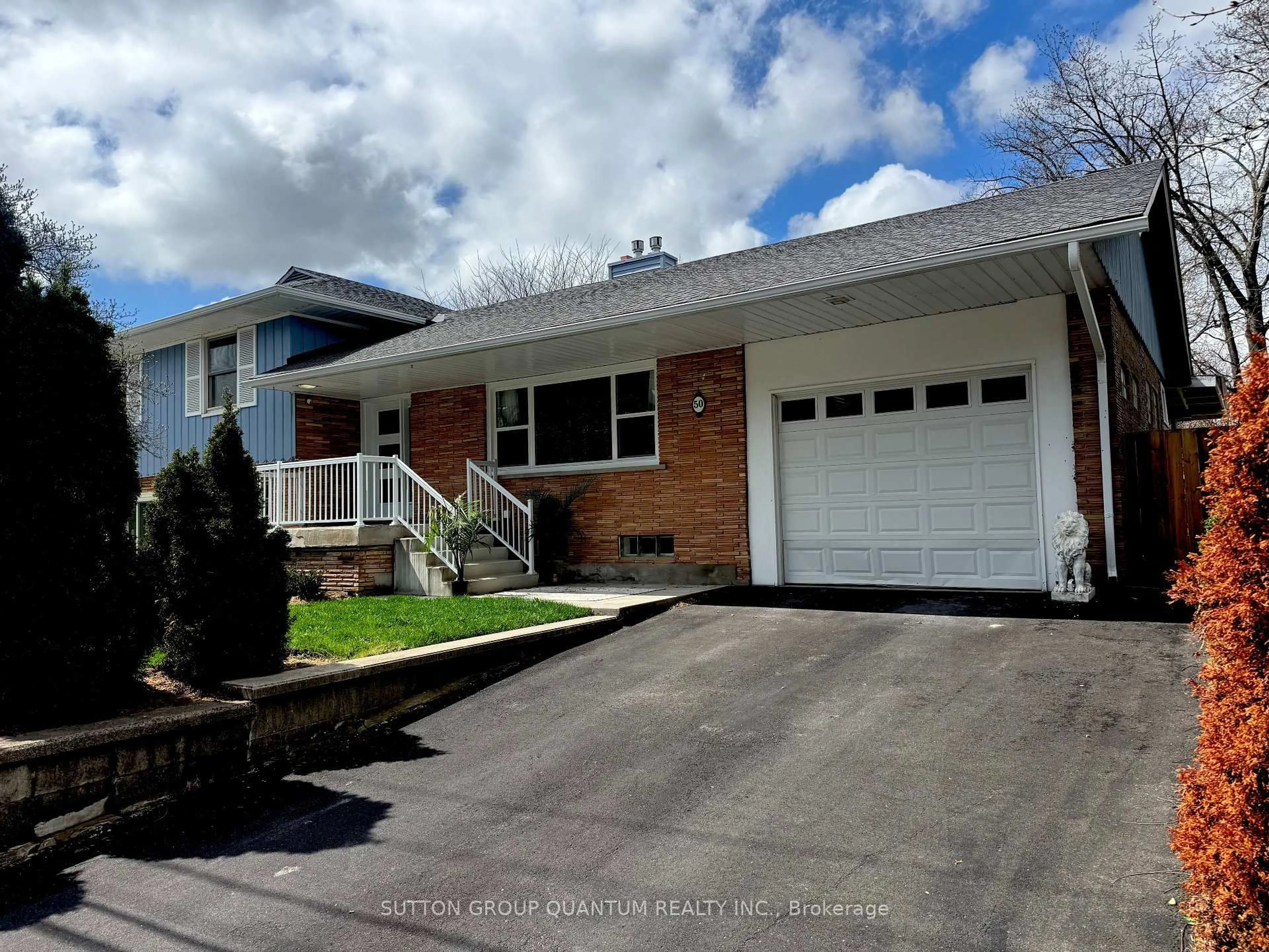 Home with vinyl exterior material, street for 50 Barton St, Hamilton Ontario L9H 1N8