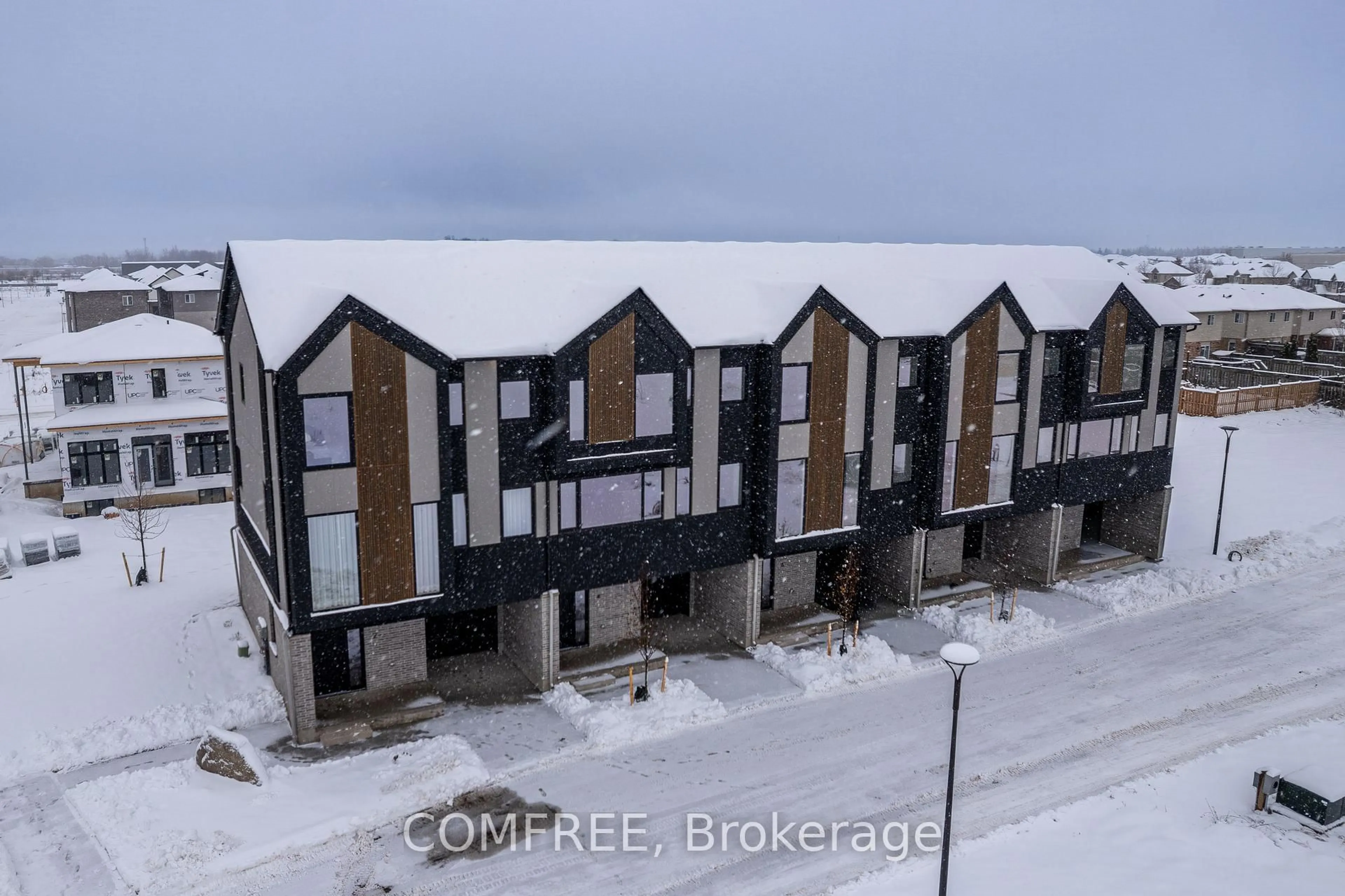 A pic from outside/outdoor area/front of a property/back of a property/a pic from drone, street for 3090 Petty Rd #2, London South Ontario N6L 0H3