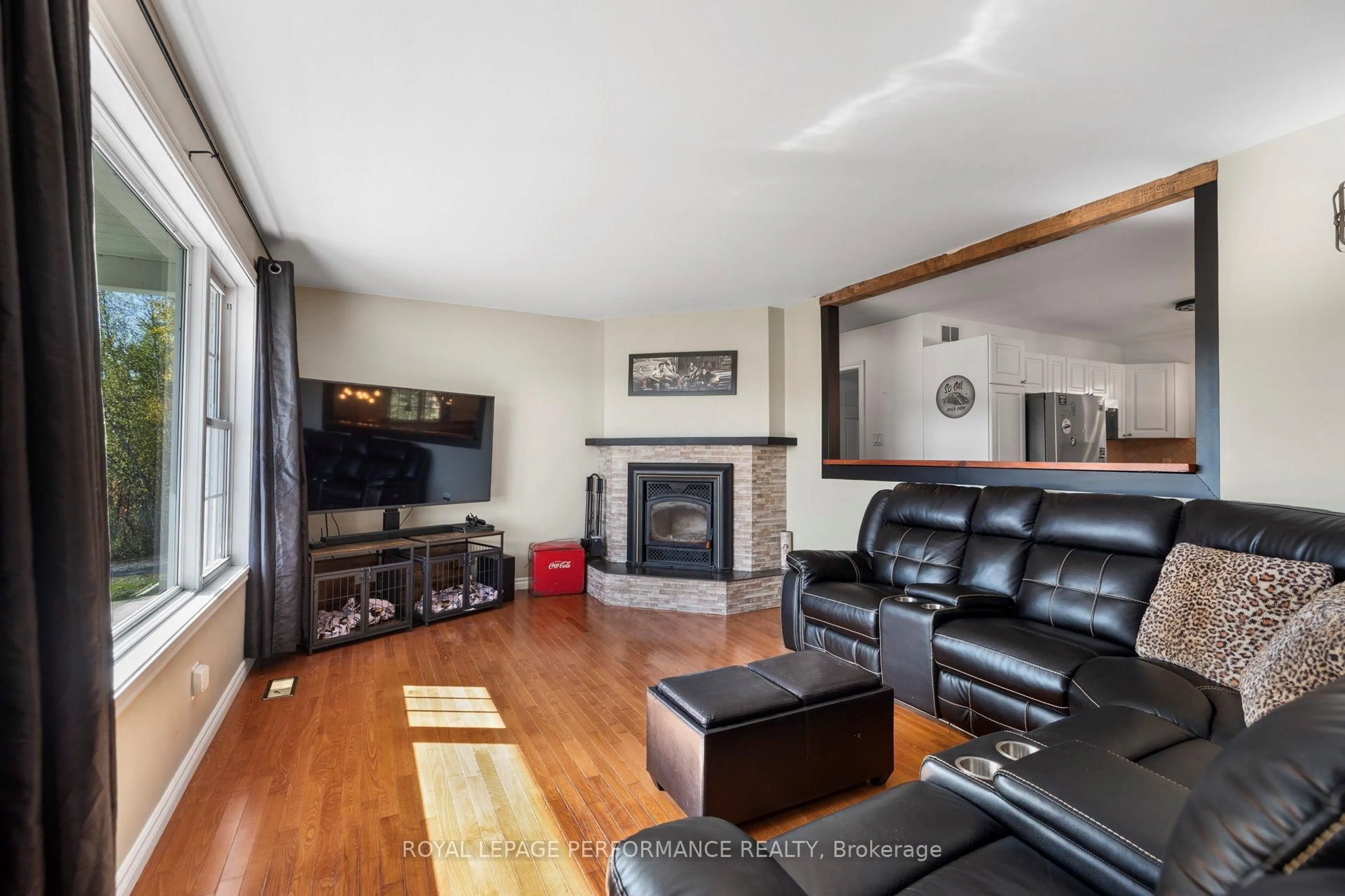 Living room with furniture, wood/laminate floor for 2150 County Road 14 Rd, Hawkesbury Ontario K0B 1B0