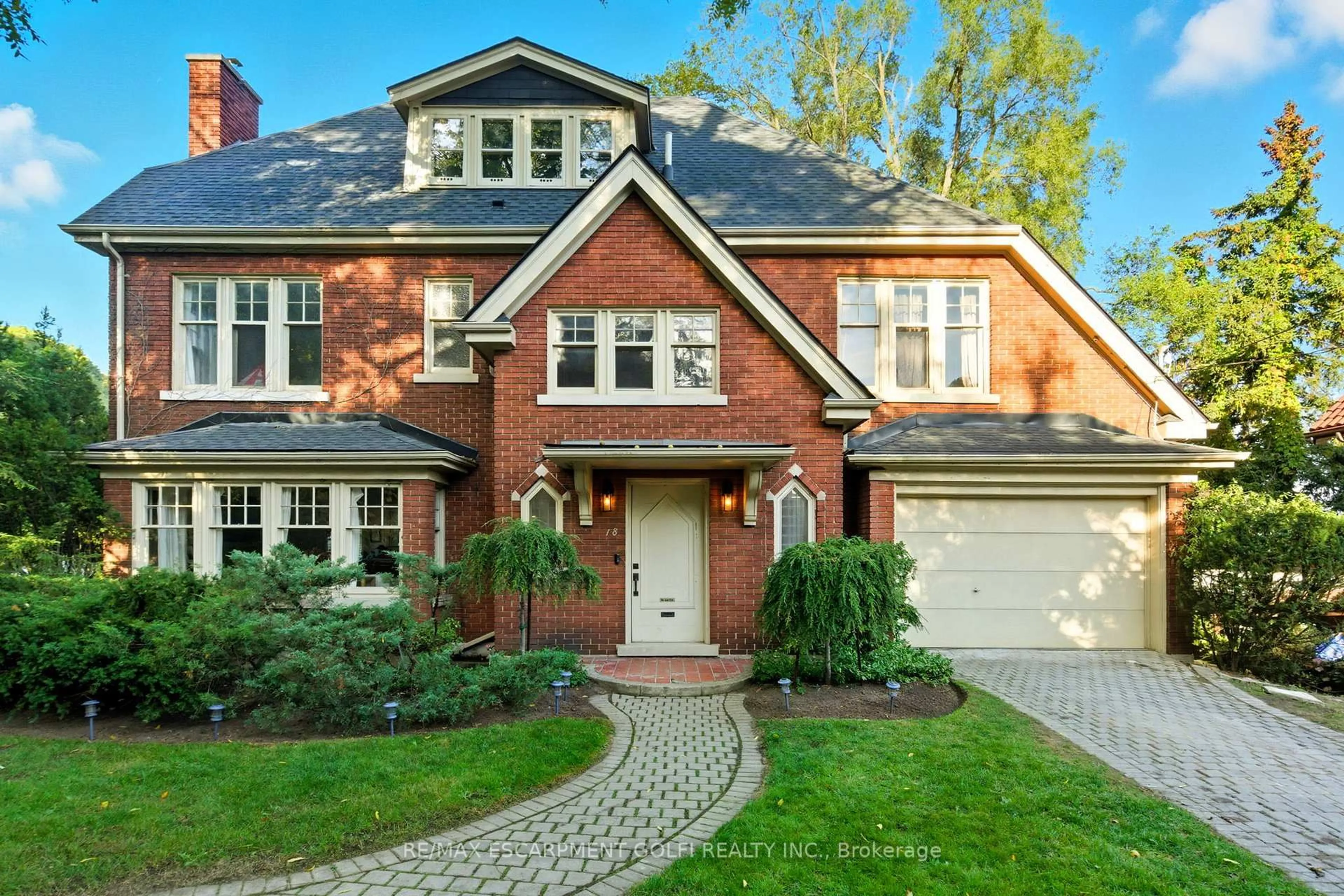 Home with brick exterior material, street for 18 Inglewood Dr, Hamilton Ontario L8P 2T2