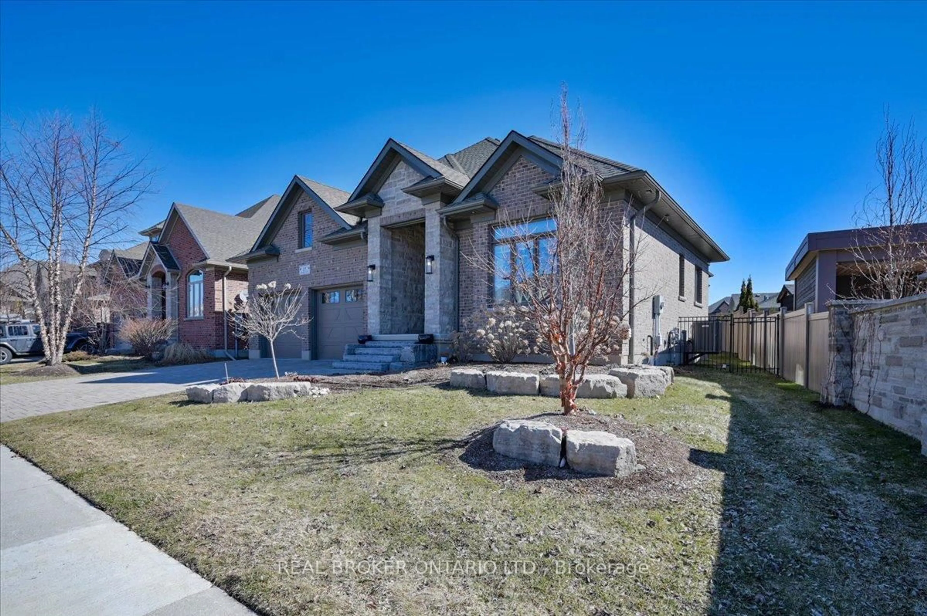 Home with brick exterior material, street for 15 LANGTON Dr, Kitchener Ontario N2P 2X9