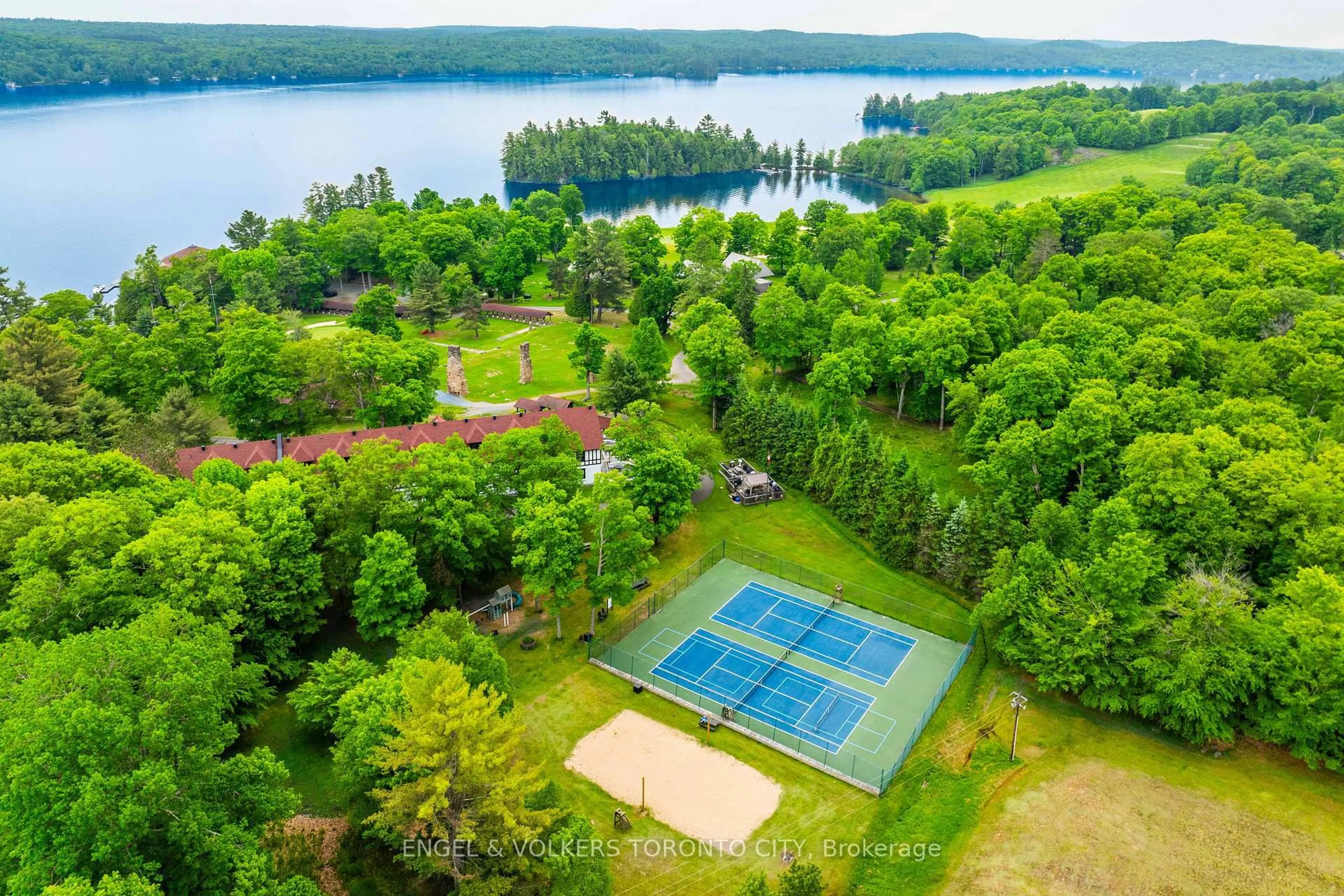 A pic from outside/outdoor area/front of a property/back of a property/a pic from drone, water/lake/river/ocean view for 12 Bigwin Island #319, Lake of Bays Ontario P0B 1A0