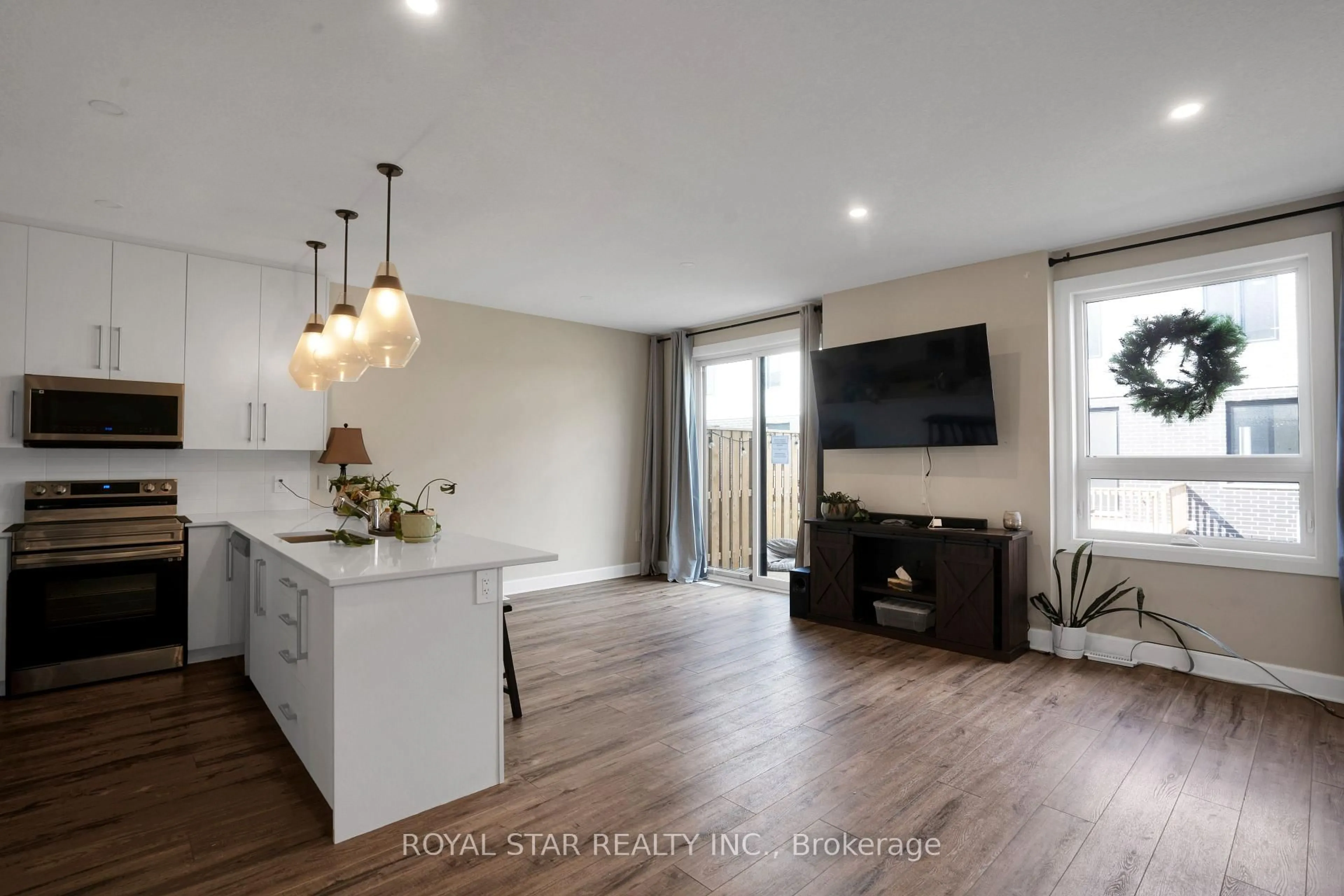 Open concept kitchen, unknown for 175 Doan Dr #108, Middlesex Centre Ontario N0L 1R0