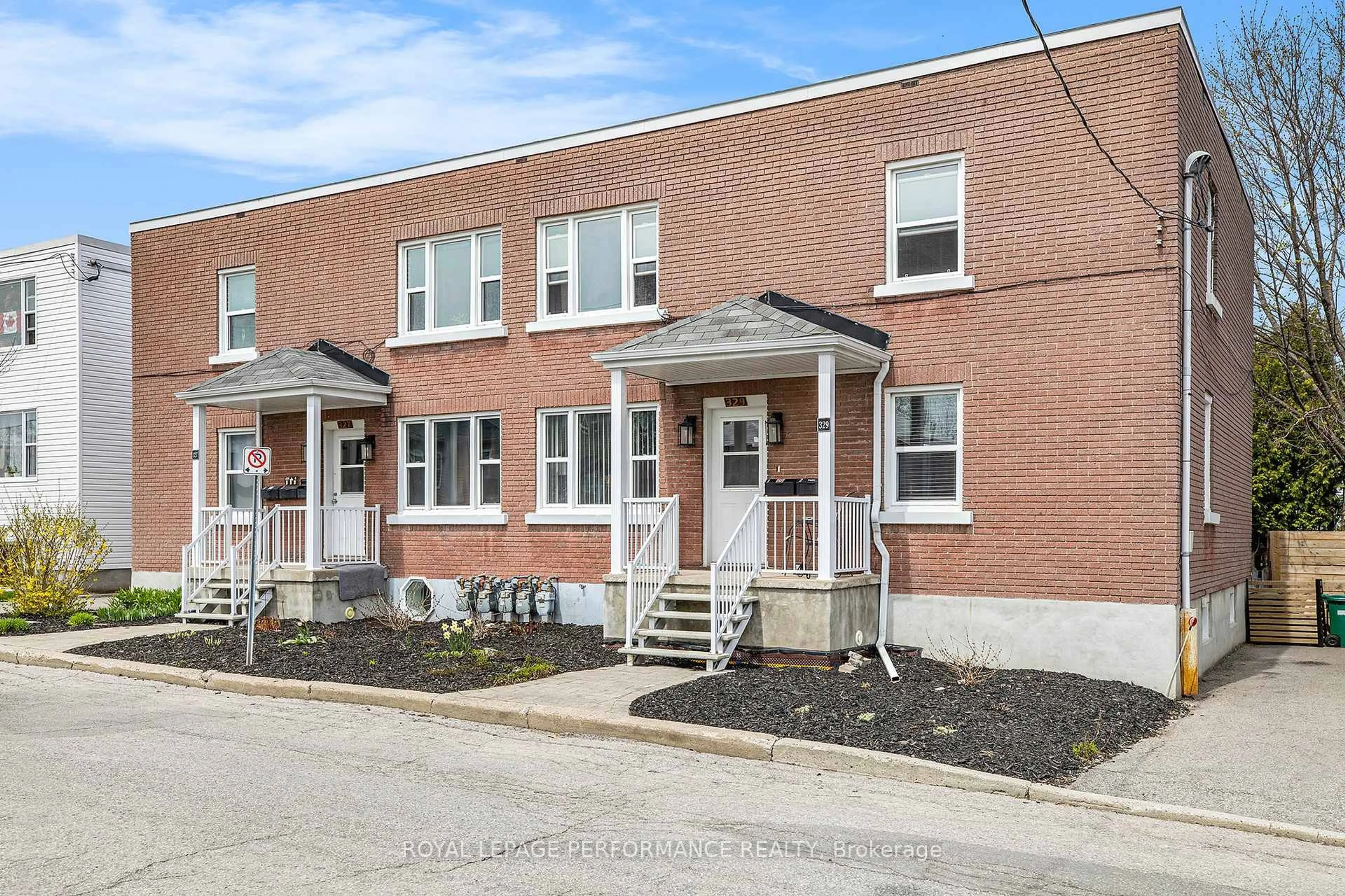 Home with brick exterior material, street for 327-329 Shakespeare St, Ottawa Ontario K1L 5M1