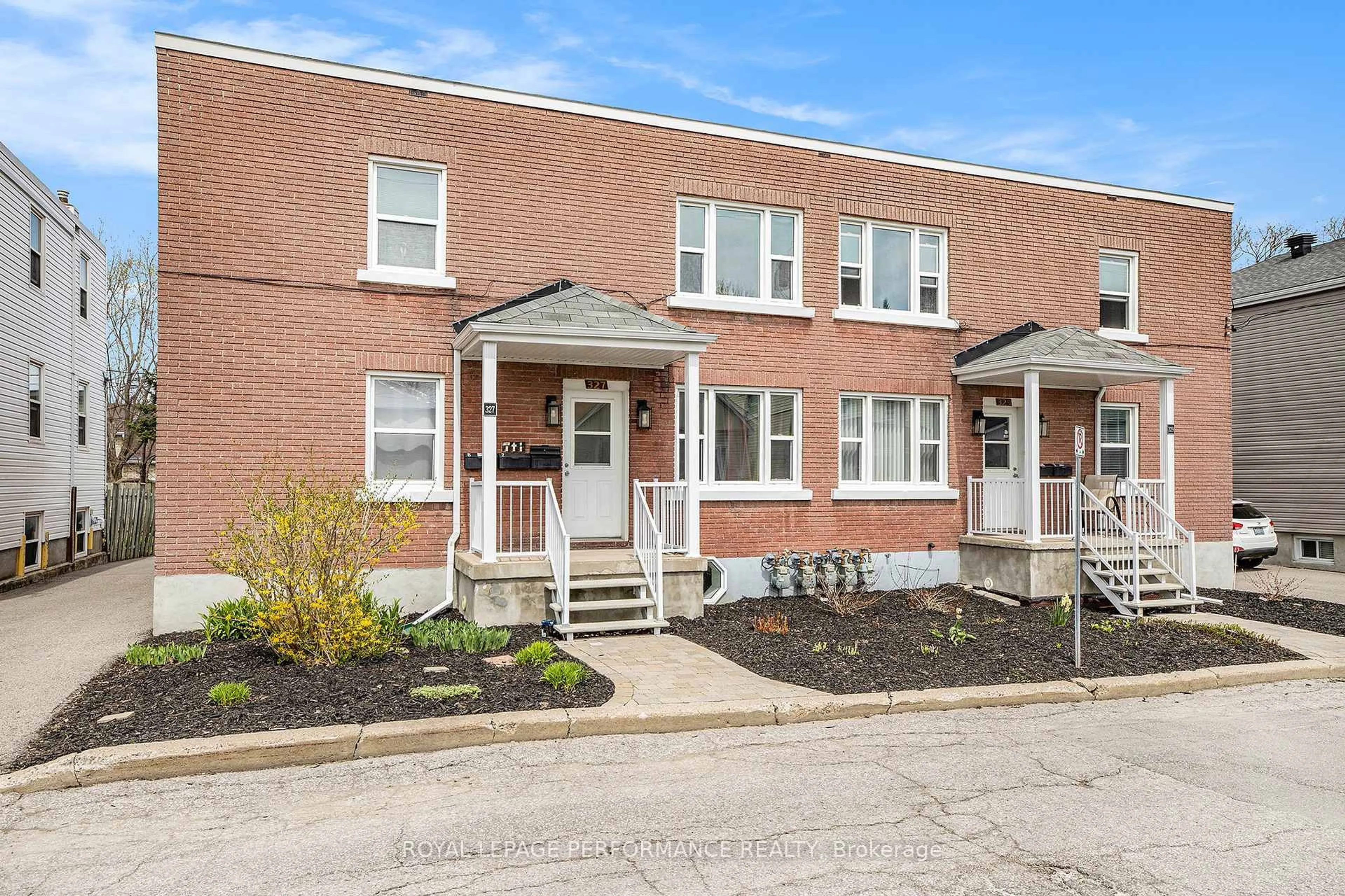 Home with brick exterior material, street for 327-329 Shakespeare St, Ottawa Ontario K1L 5M1