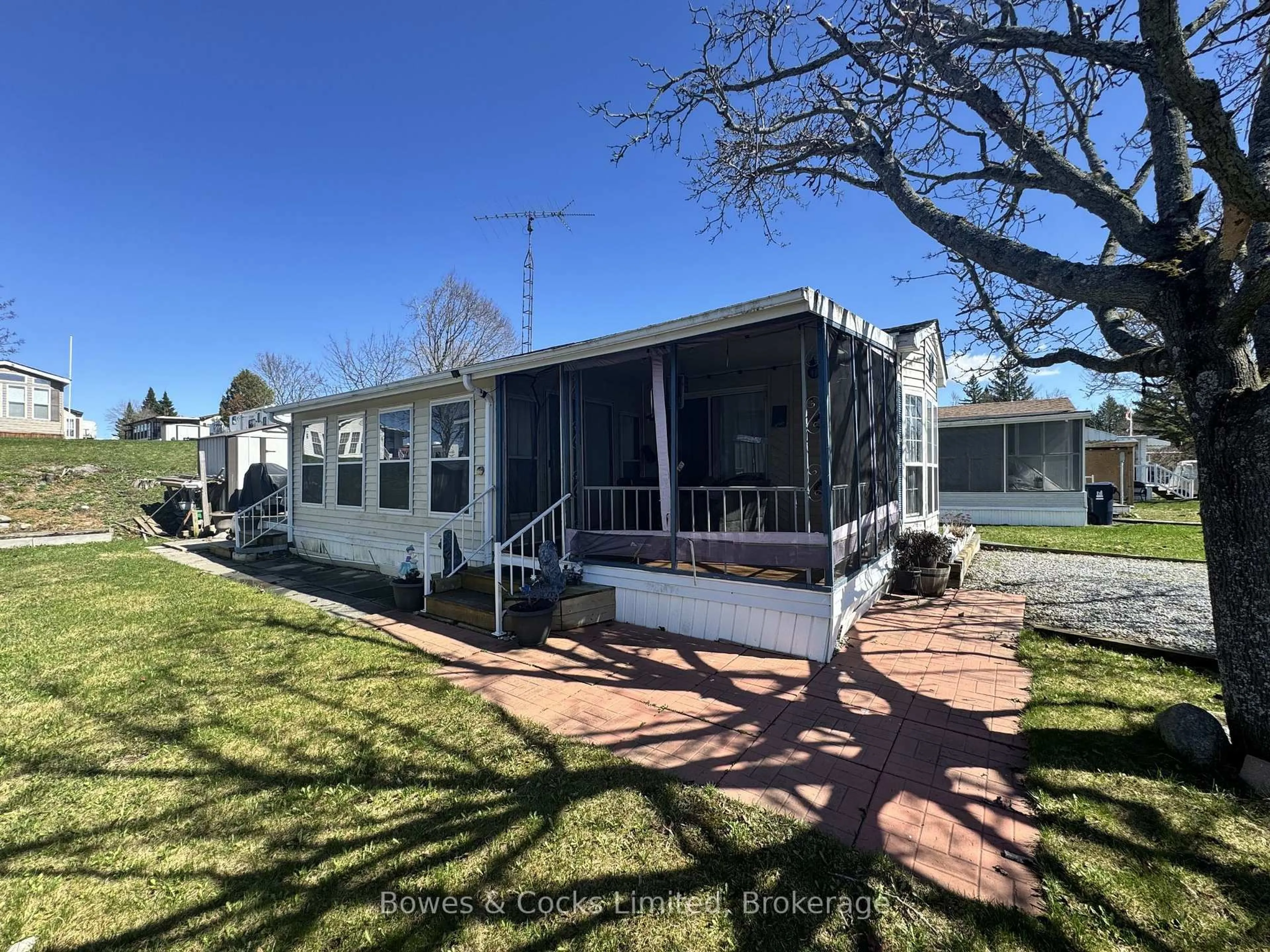 Home with vinyl exterior material, street for 13 Trillium Dr, Otonabee-South Monaghan Ontario K0L 2G0