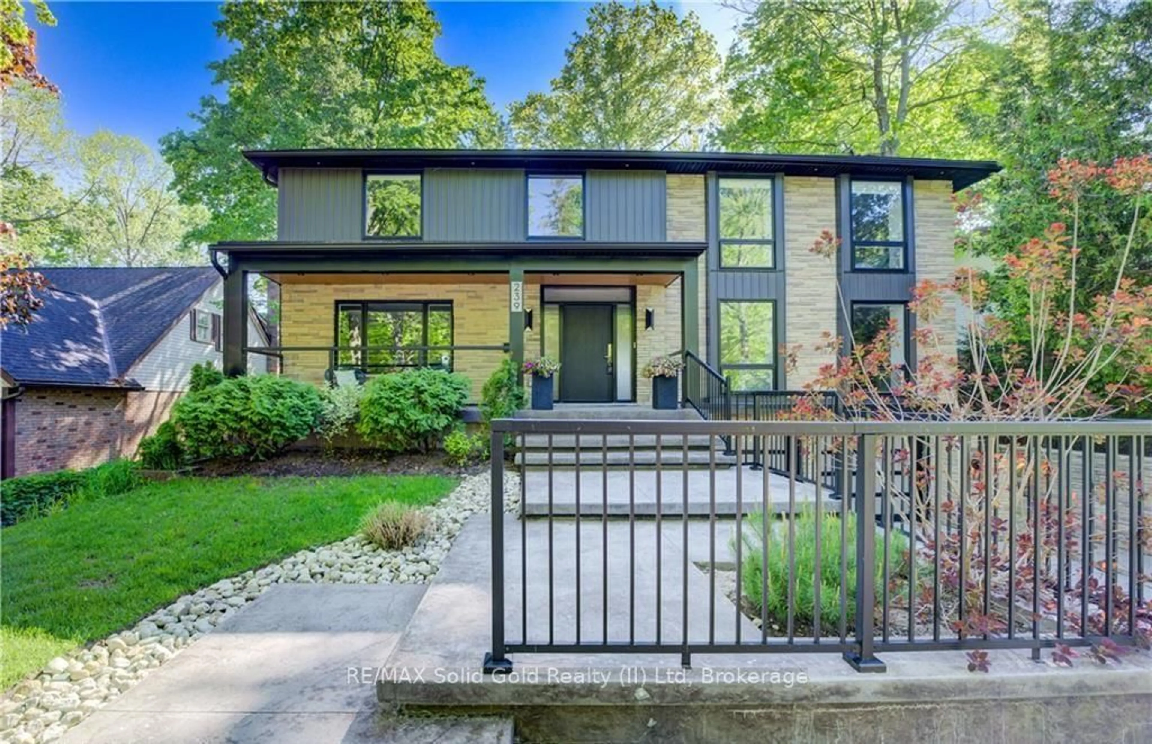 Home with brick exterior material, street for 239 Corrie Cres, Waterloo Ontario N2L 5W3