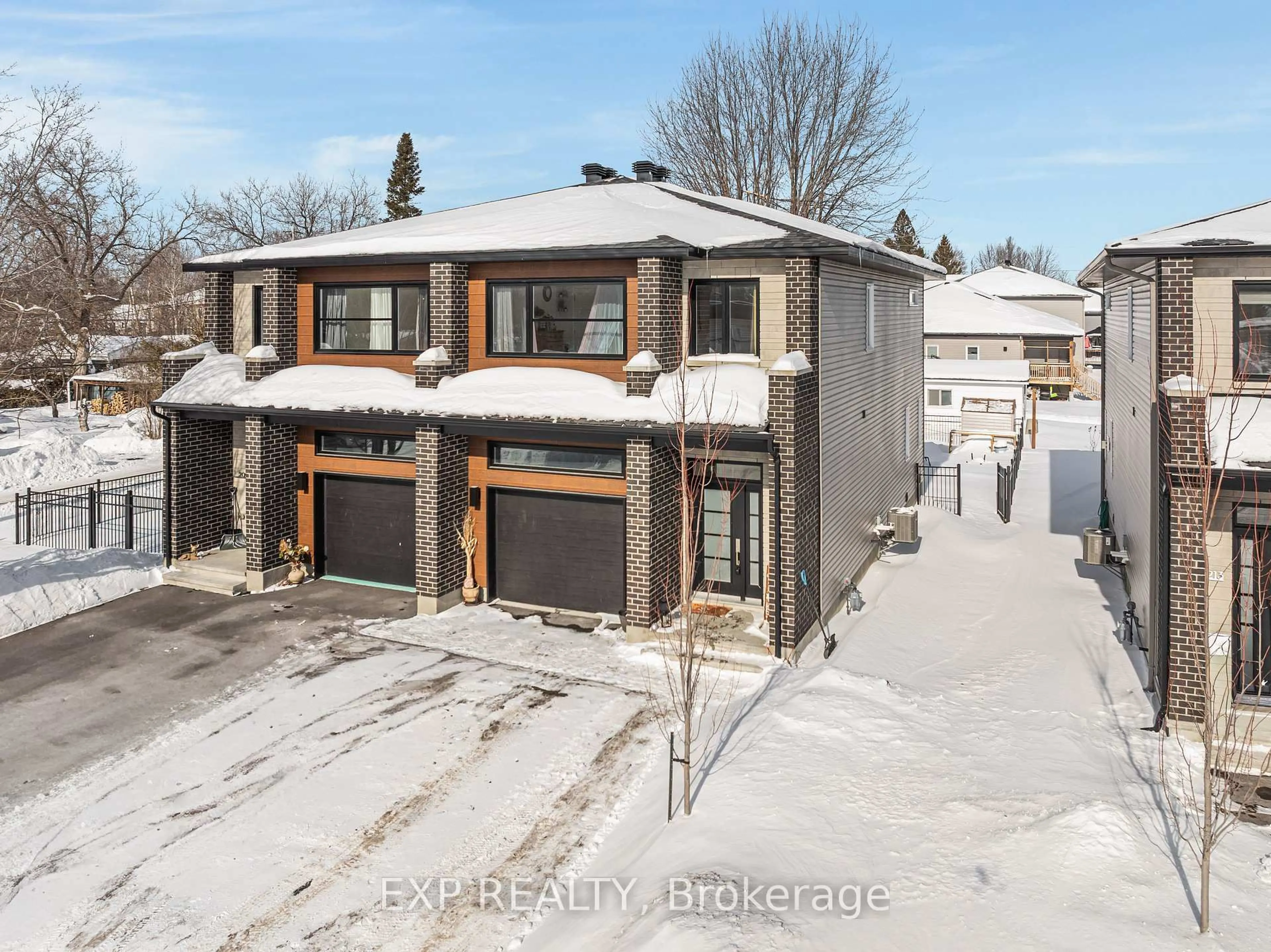 A pic from outside/outdoor area/front of a property/back of a property/a pic from drone, street for 211 Mabel Rd, The Nation Ontario K0A 2M0